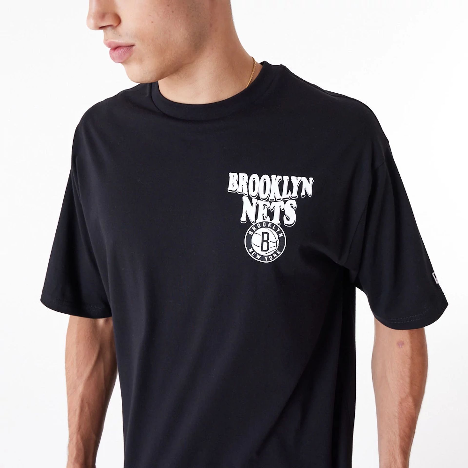 The Male model is wearing Brooklyn Nets NBA Script Black Oversized T-Shirt 5