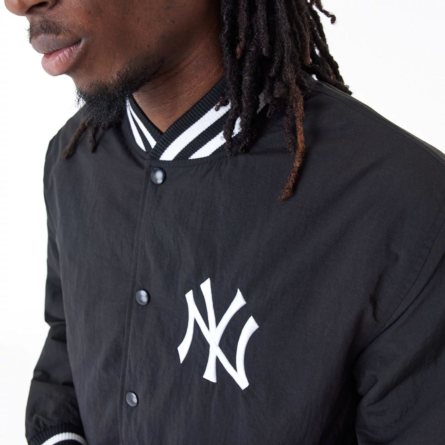 The Male model is wearing New York Yankees MLB Team Wordmark Black Bomber Jacket 3