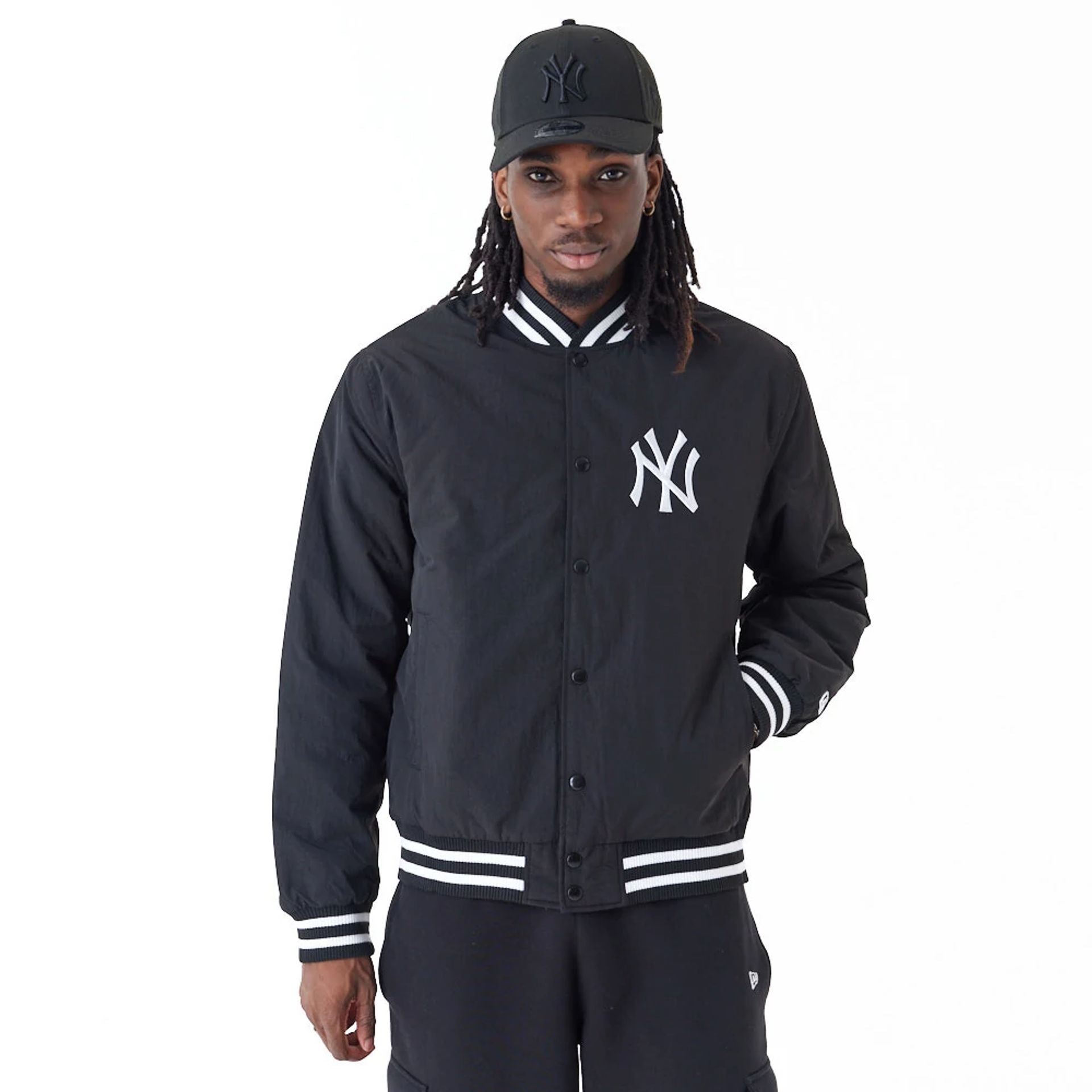 The Male model is wearing New York Yankees MLB Team Wordmark Black Bomber Jacket 1