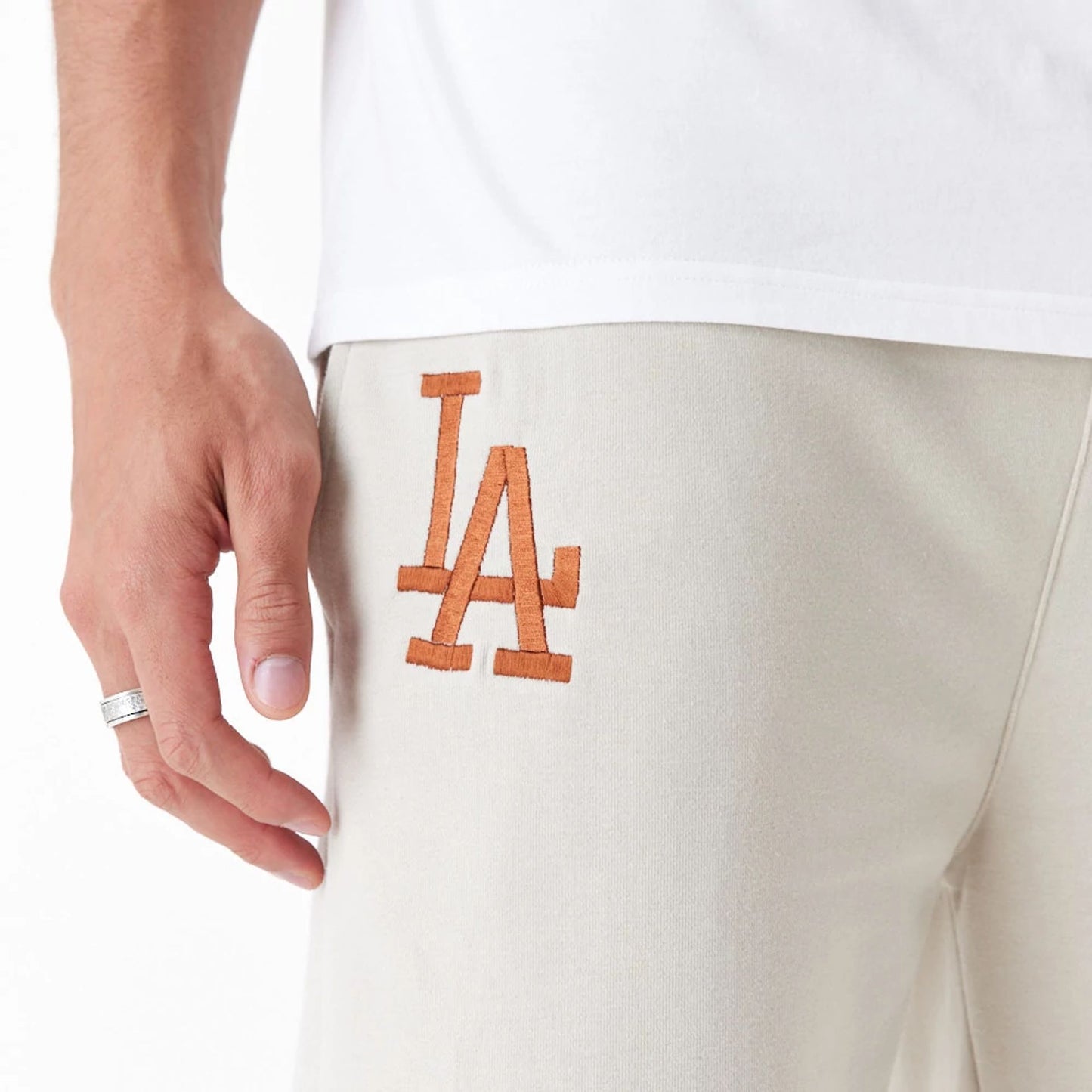 The Male model is wearing LA Dodgers League Essential Stone Joggers 7