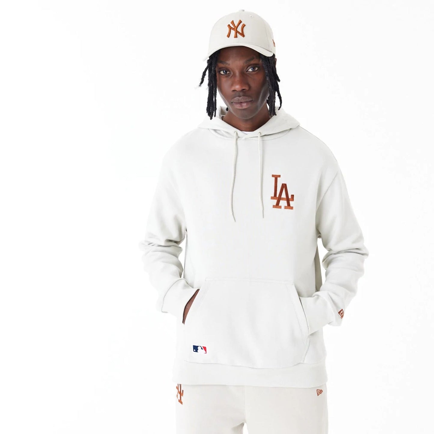 The Male model is wearing LA Dodgers League Essential Stone Oversized Pullover Hoodie 11