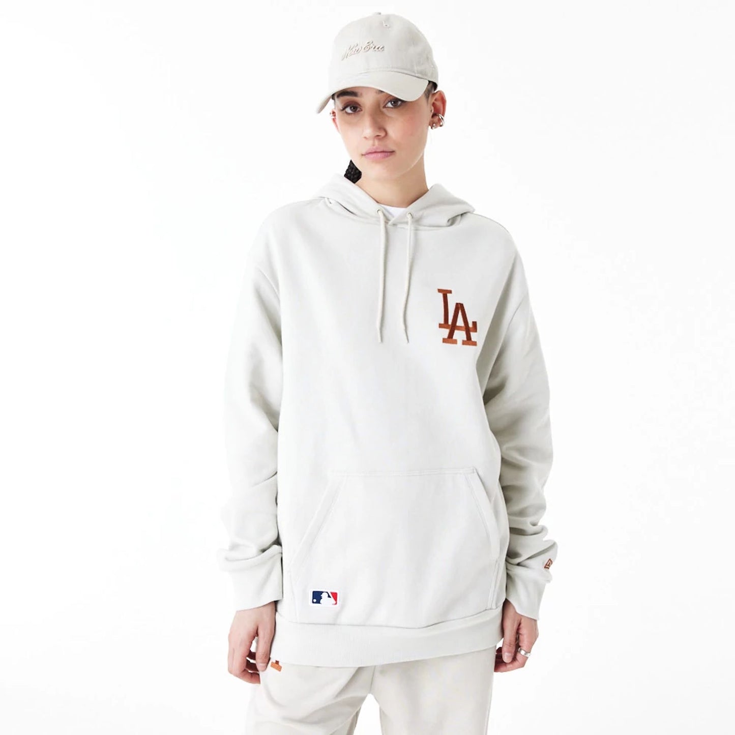 The Male model is wearing LA Dodgers League Essential Stone Oversized Pullover Hoodie 12