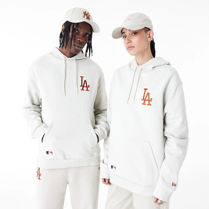 The Male model is wearing LA Dodgers League Essential Stone Oversized Pullover Hoodie 1