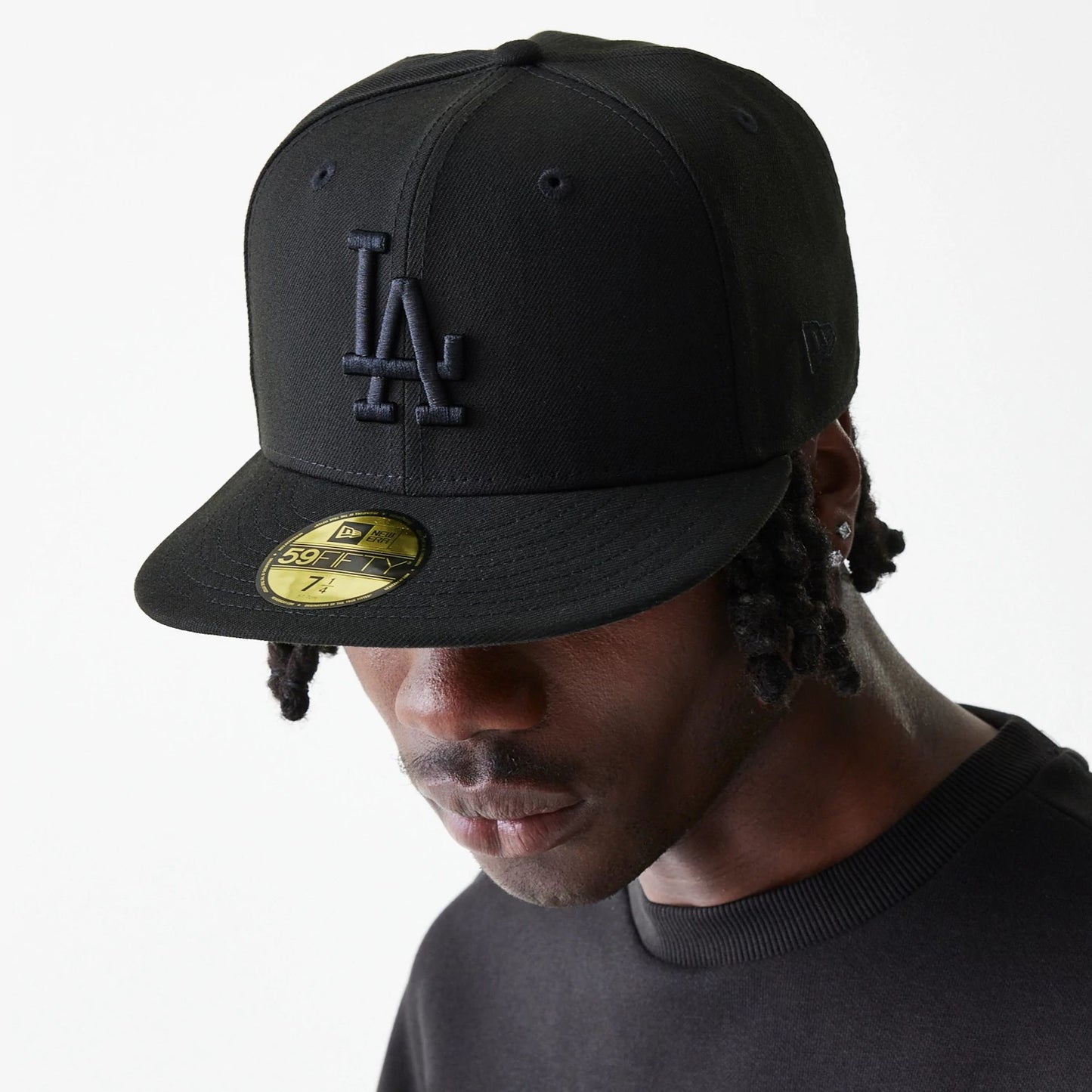 This is a LA Dodgers League Essential Black 59FIFTY Fitted Cap 1