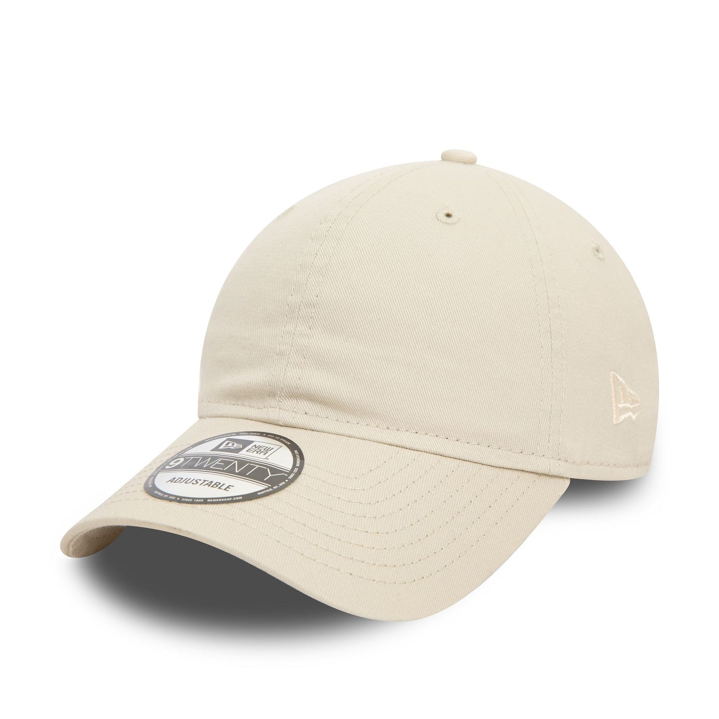 This is a New Era Essential Light Beige 9TWENTY Adjustable Cap 1