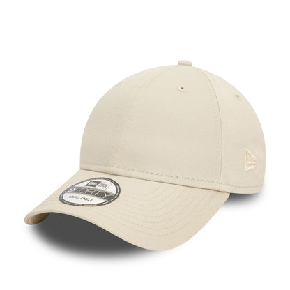 This is a New Era Essential Light Beige 9FORTY Adjustable Cap 1