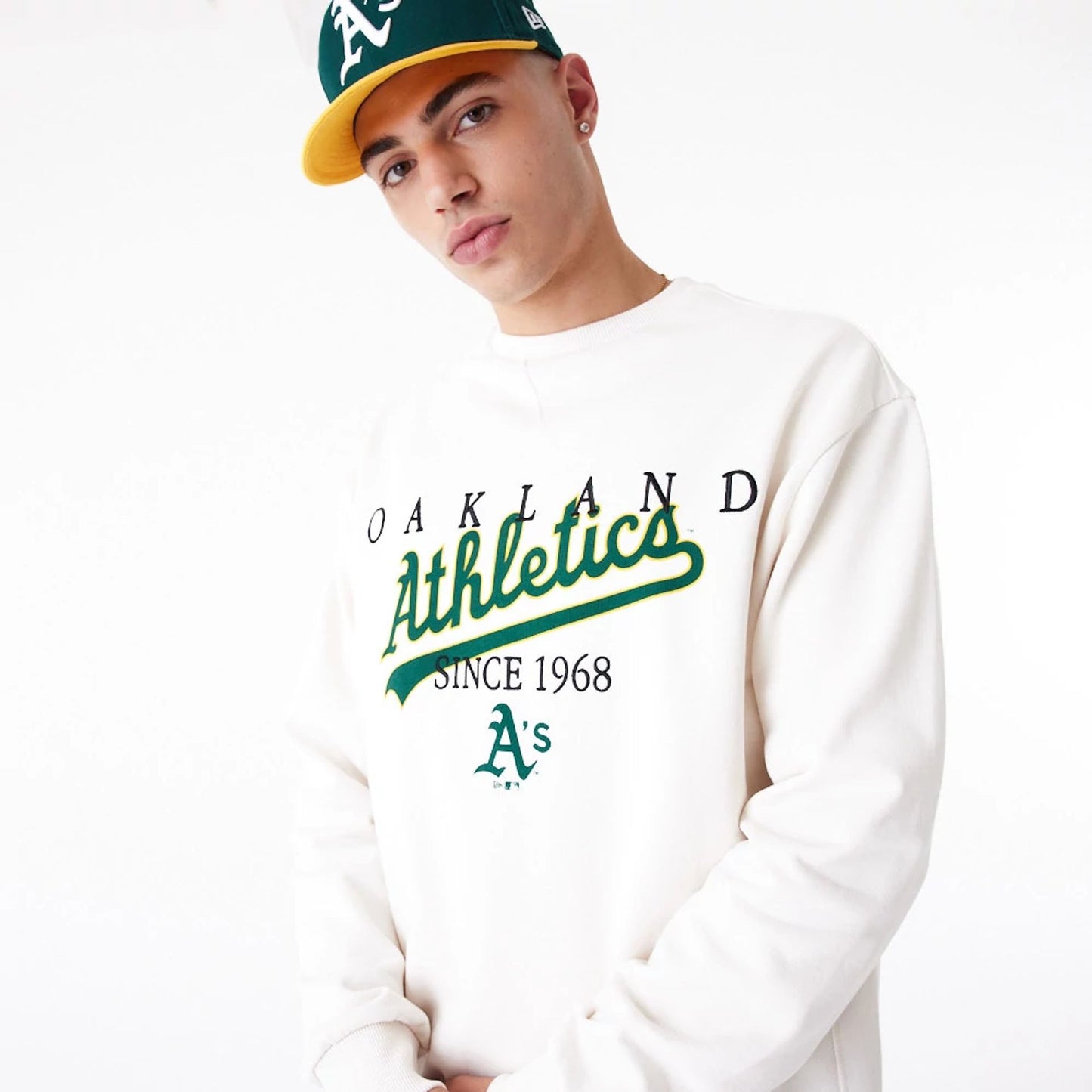 The Male model is wearing Oakland Athletics MLB Lifestyle Off White Crew Neck Sweatshirt 5