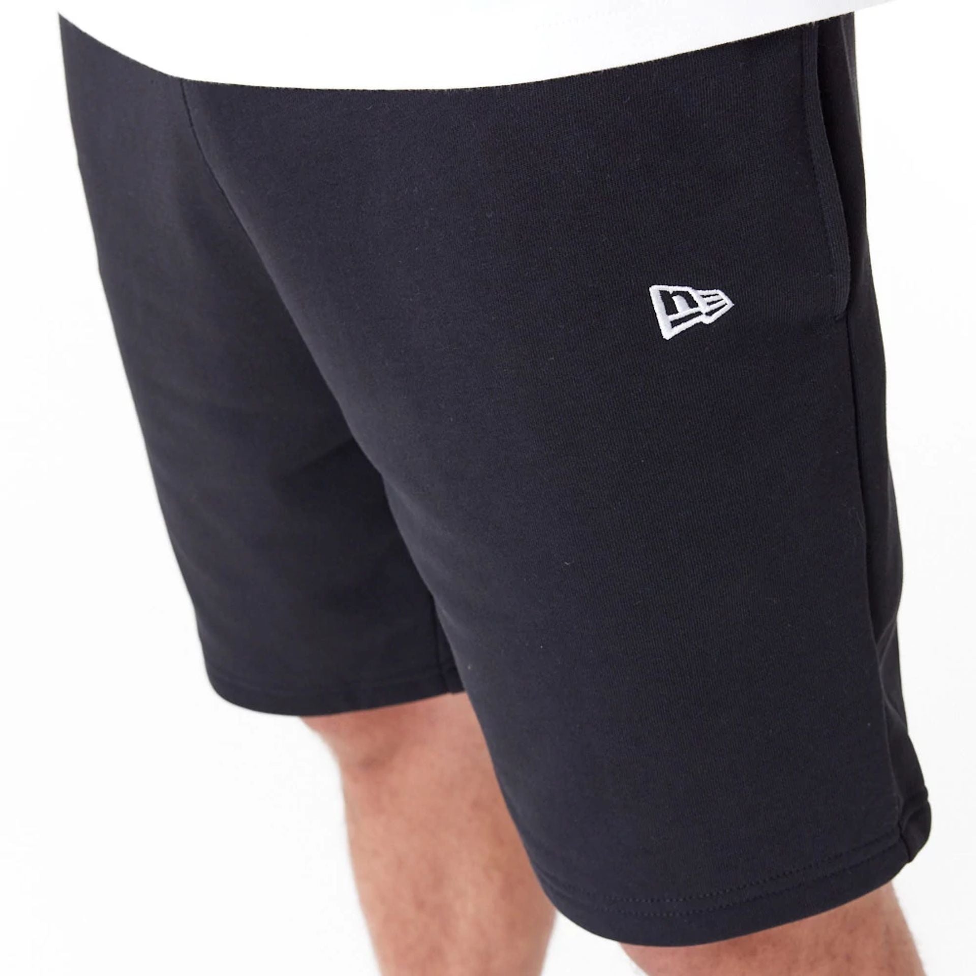 The Male model is wearing Detroit Tigers League Essential Black Shorts 4