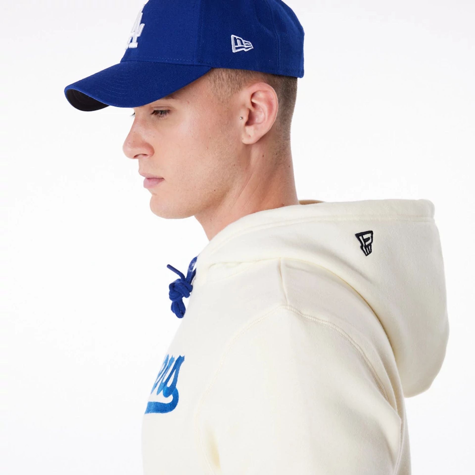 The Male model is wearing LA Dodgers MLB Chrome White Pullover Hoodie 4