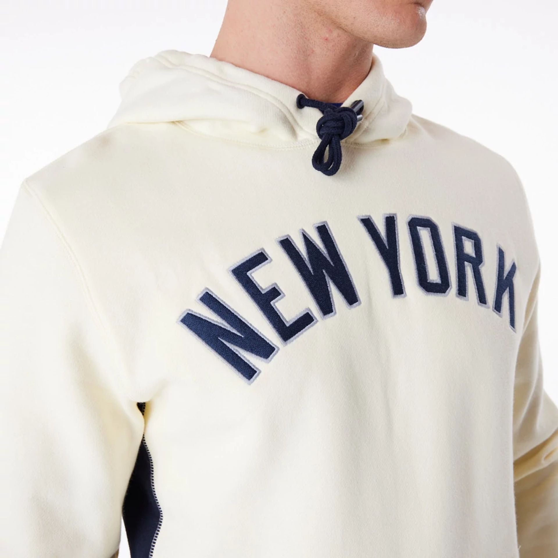 The Male model is wearing New York Yankees MLB Chrome White Pullover Hoodie 6