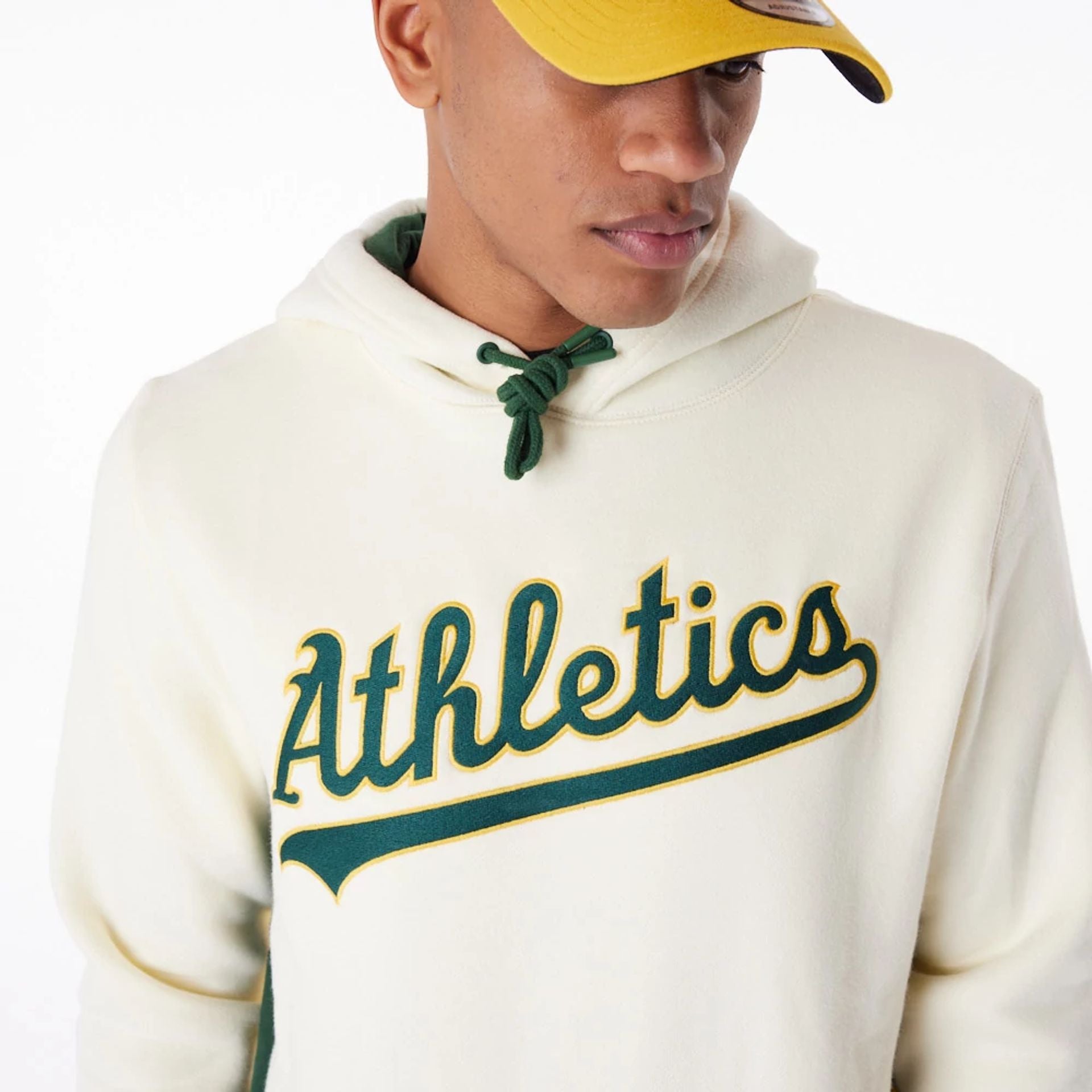 The Male model is wearing Oakland Athletics MLB Chrome White Pullover Hoodie 2