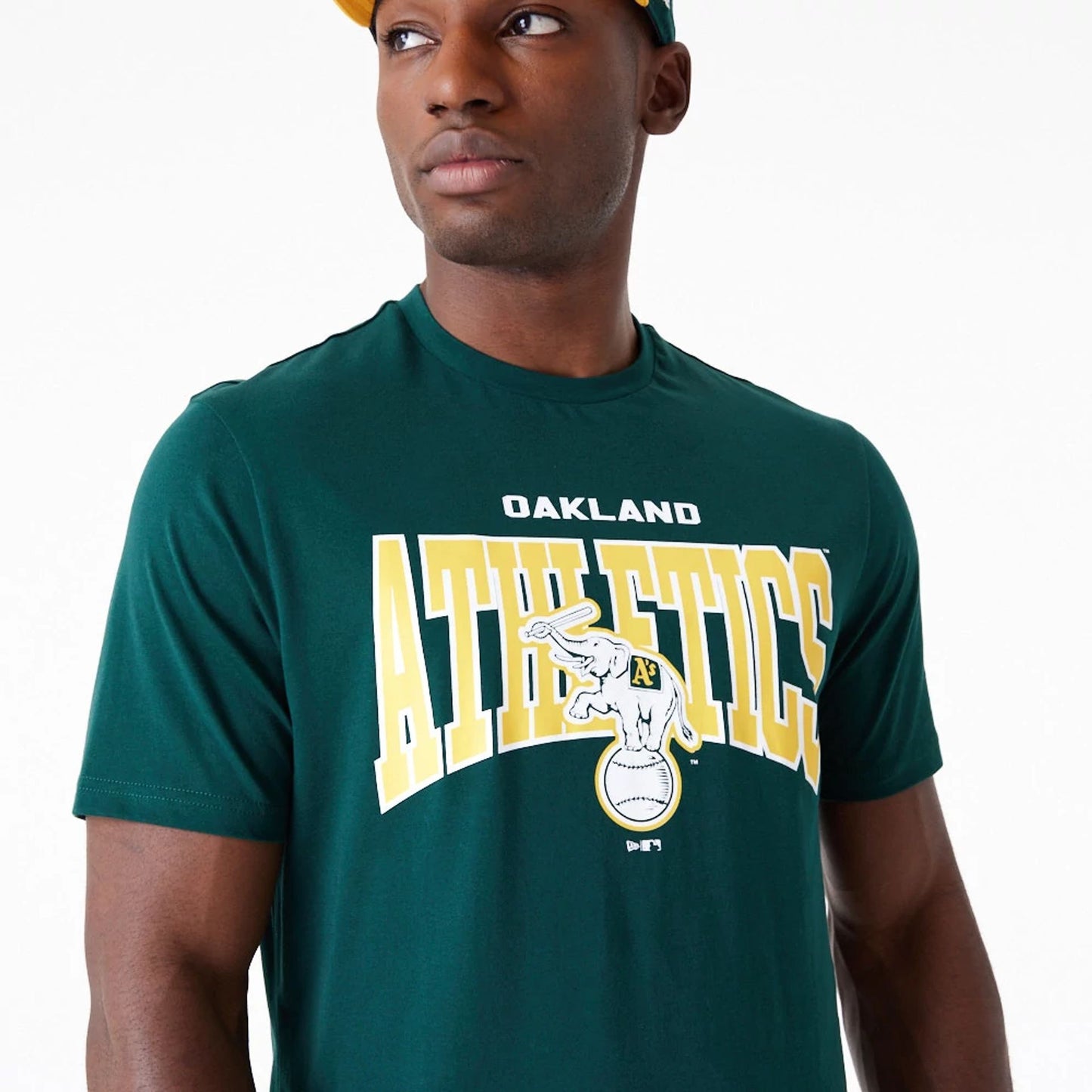 The Male model is wearing Oakland Athletics MLB Arch Wordmark Graphic Dark Green T-Shirt 6