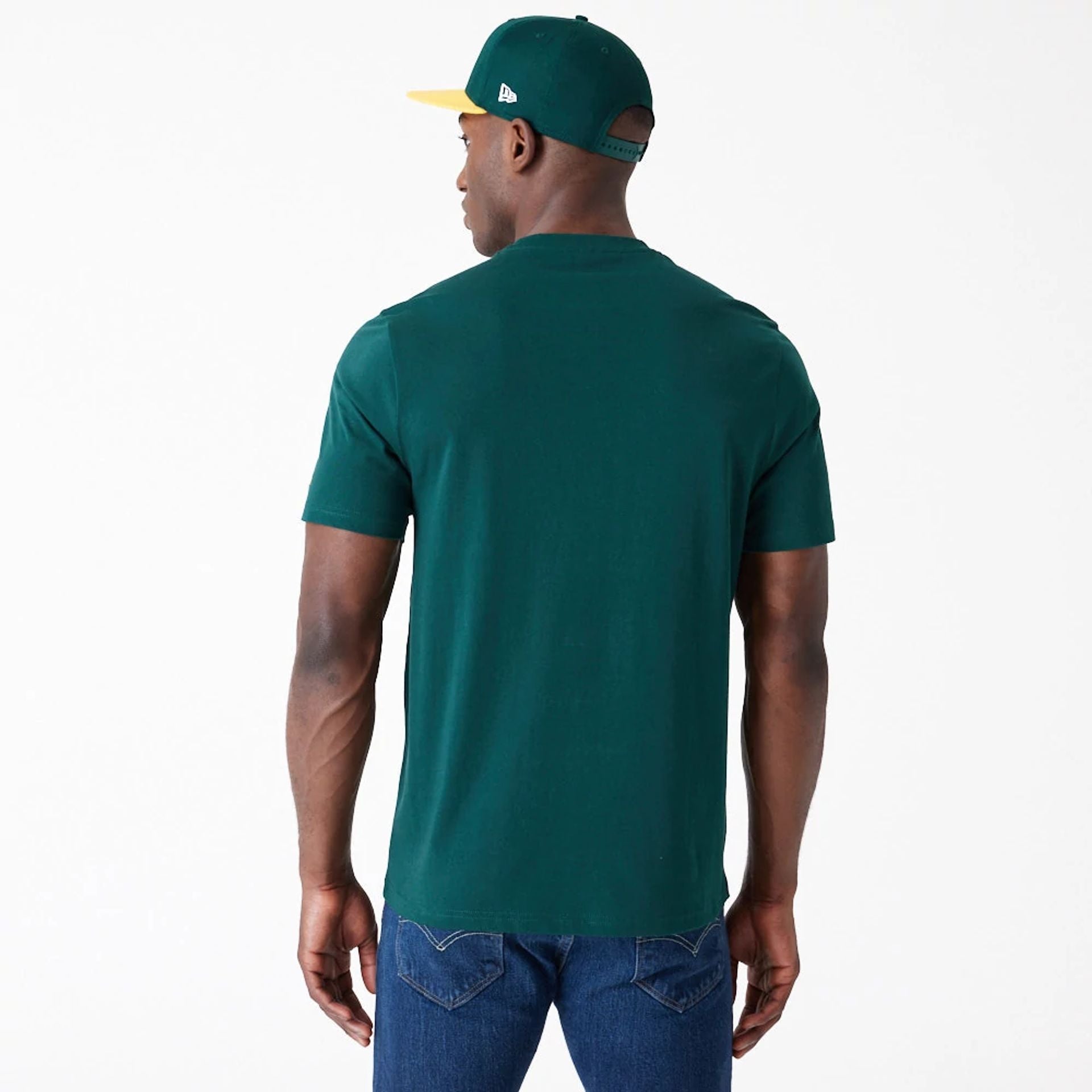 The Male model is wearing Oakland Athletics MLB Arch Wordmark Graphic Dark Green T-Shirt 7