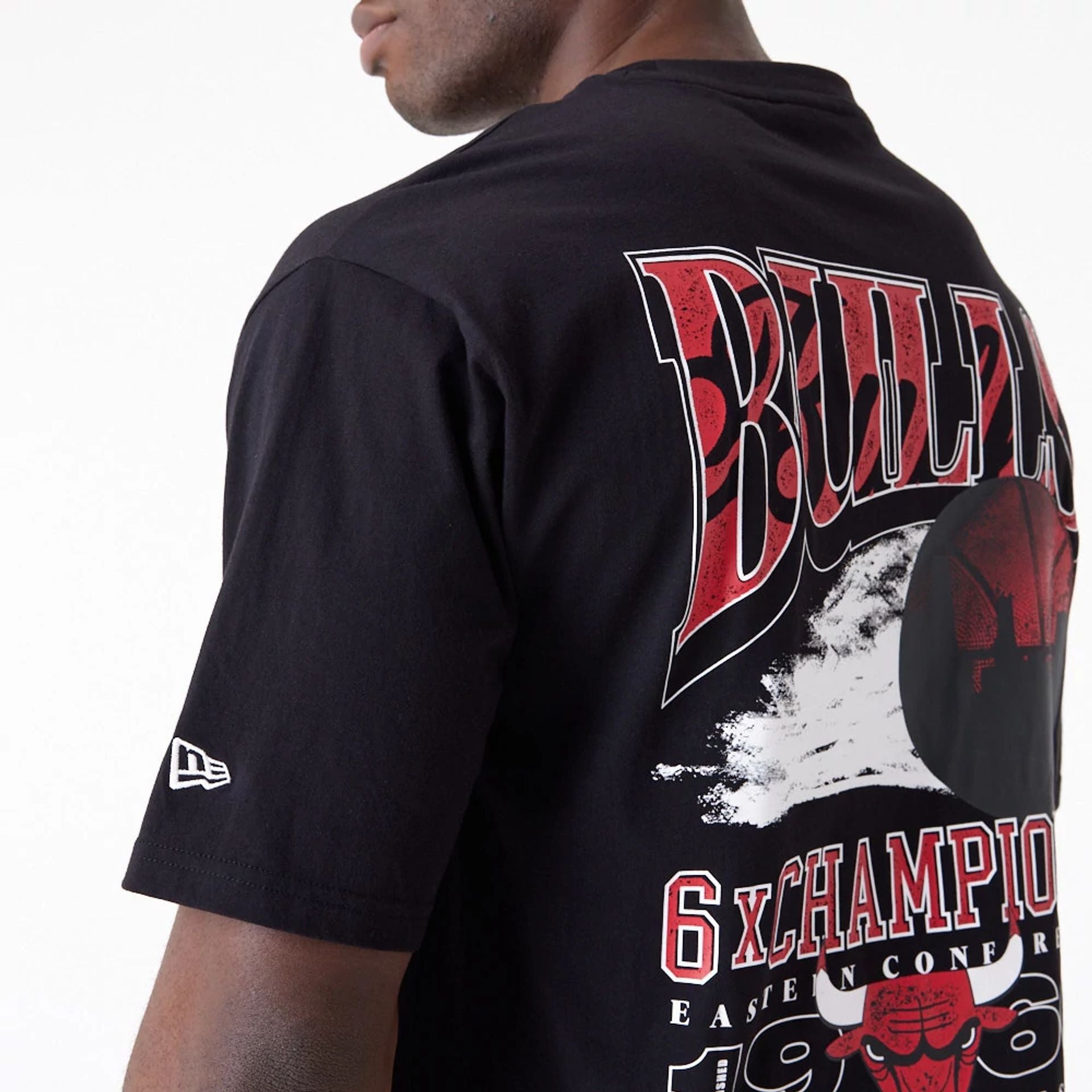 The Male model is wearing Chicago Bulls NBA Championship Black Oversized T-Shirt 4