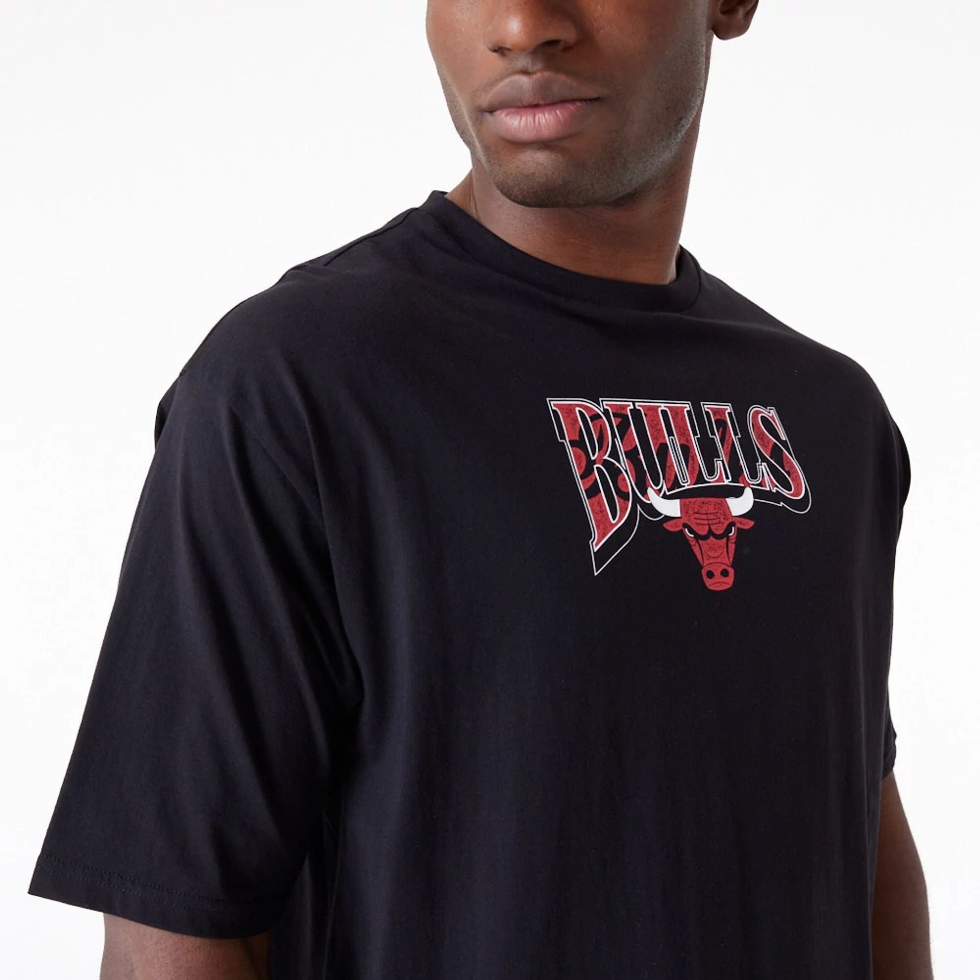 The Male model is wearing Chicago Bulls NBA Championship Black Oversized T-Shirt 5