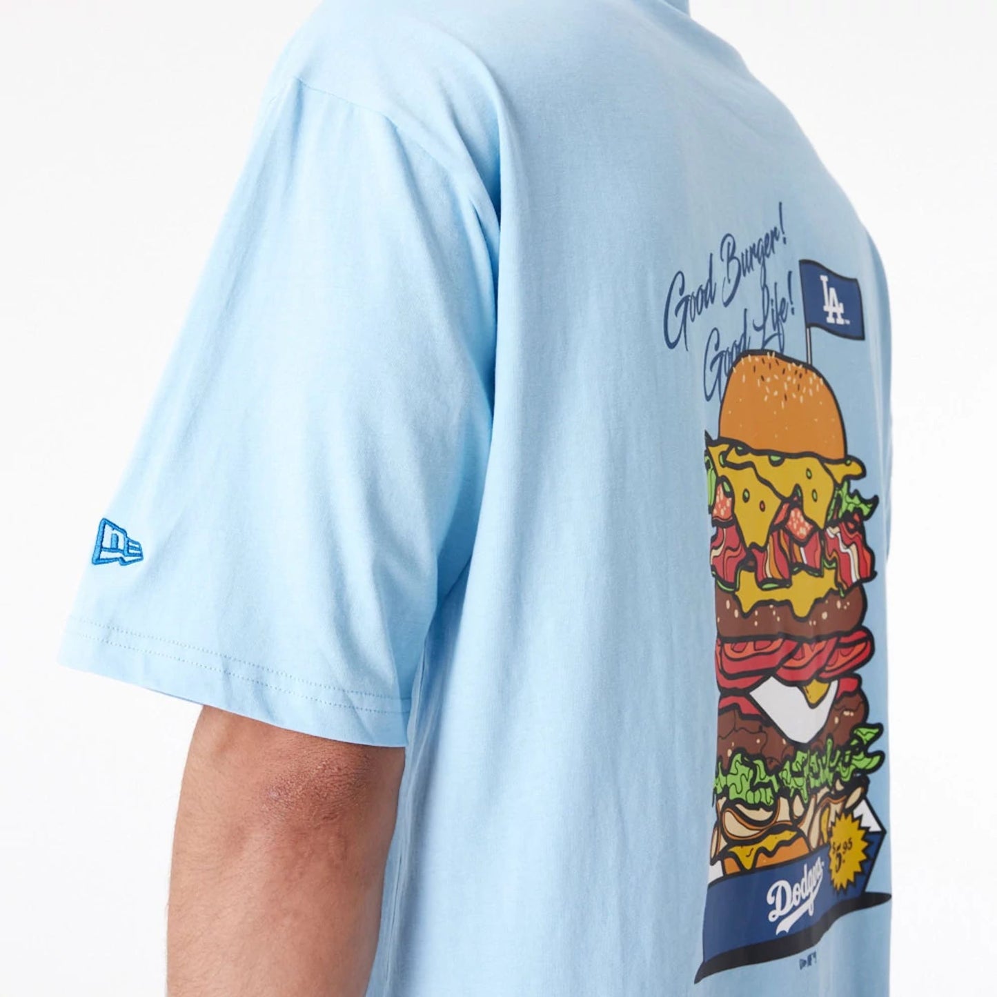 The Male model is wearing LA Dodgers MLB Burger Graphic Pastel Blue Oversized T-Shirt 4