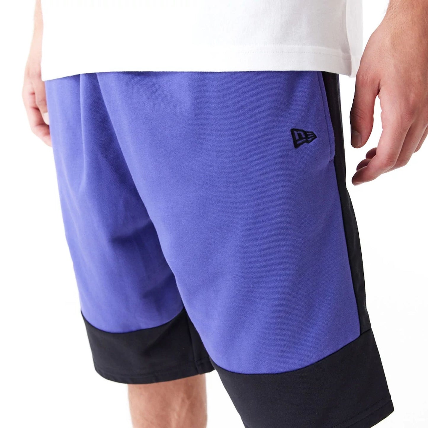 The Male model is wearing Phoenix Suns NBA Colour Block Dark Purple Shorts 3