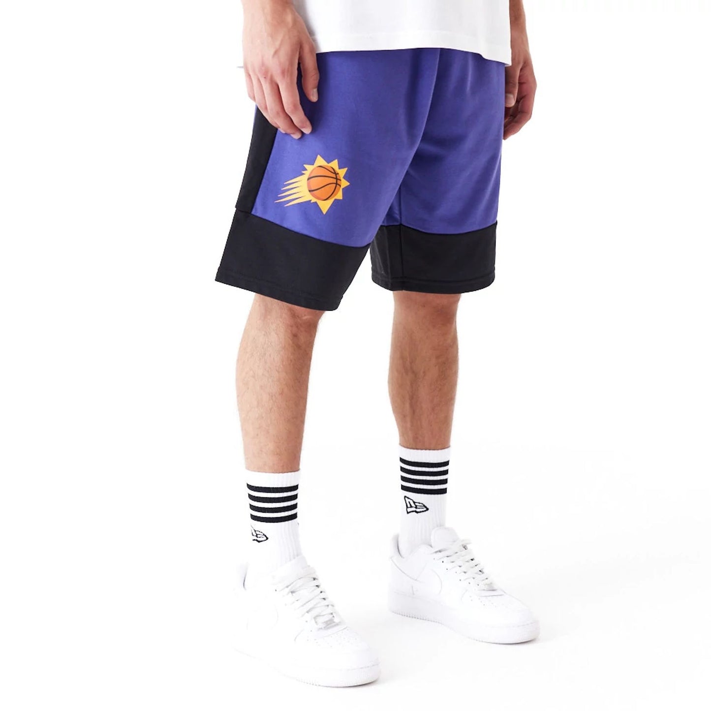 The Male model is wearing Phoenix Suns NBA Colour Block Dark Purple Shorts 1