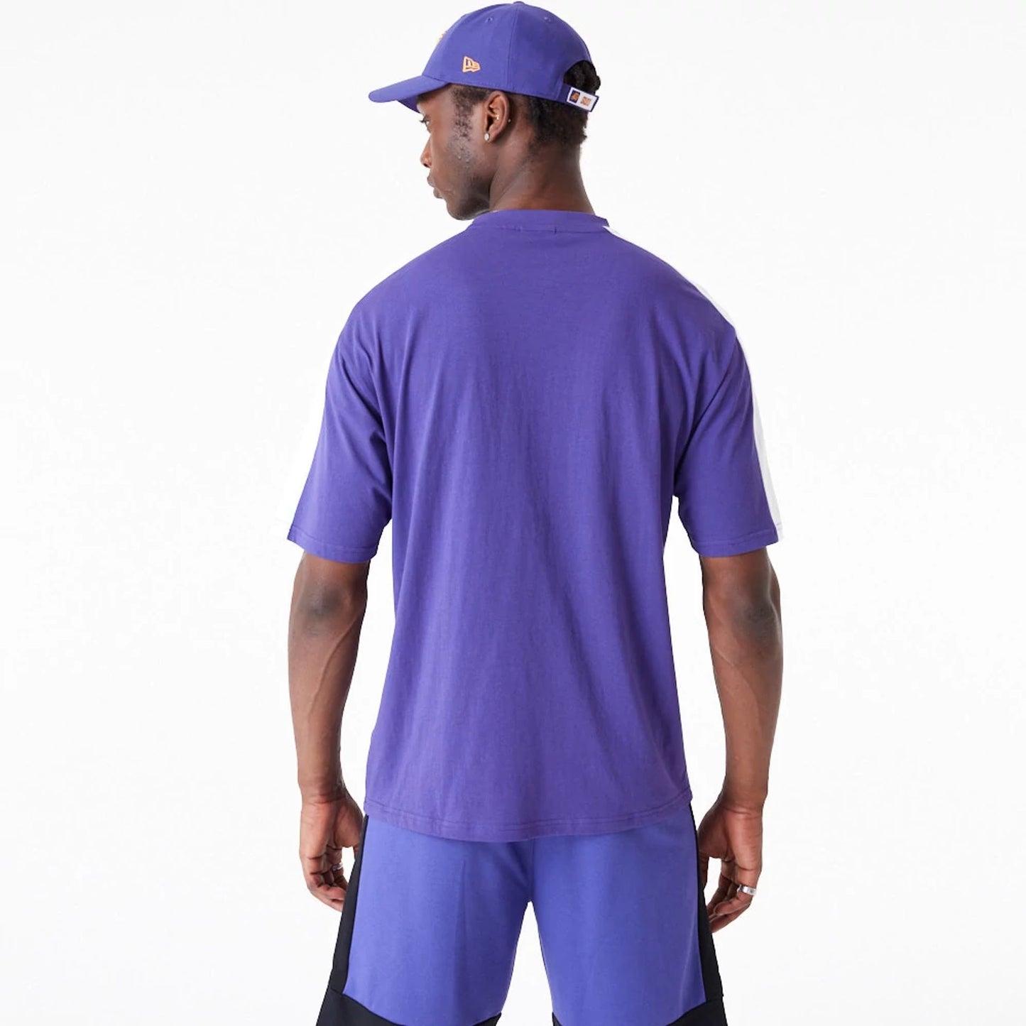 The Male model is wearing Phoenix Suns NBA Colour Block Dark Purple Oversized T-Shirt 2