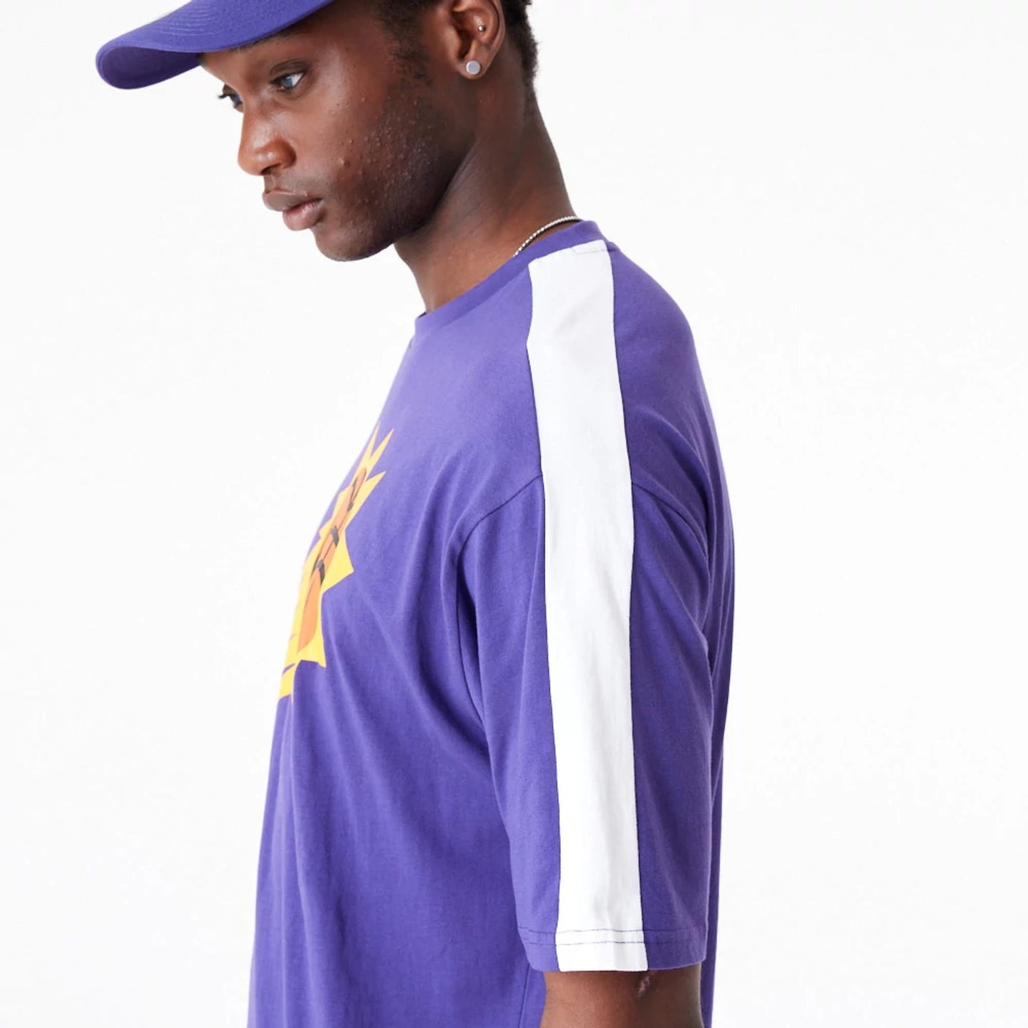 The Male model is wearing Phoenix Suns NBA Colour Block Dark Purple Oversized T-Shirt 6