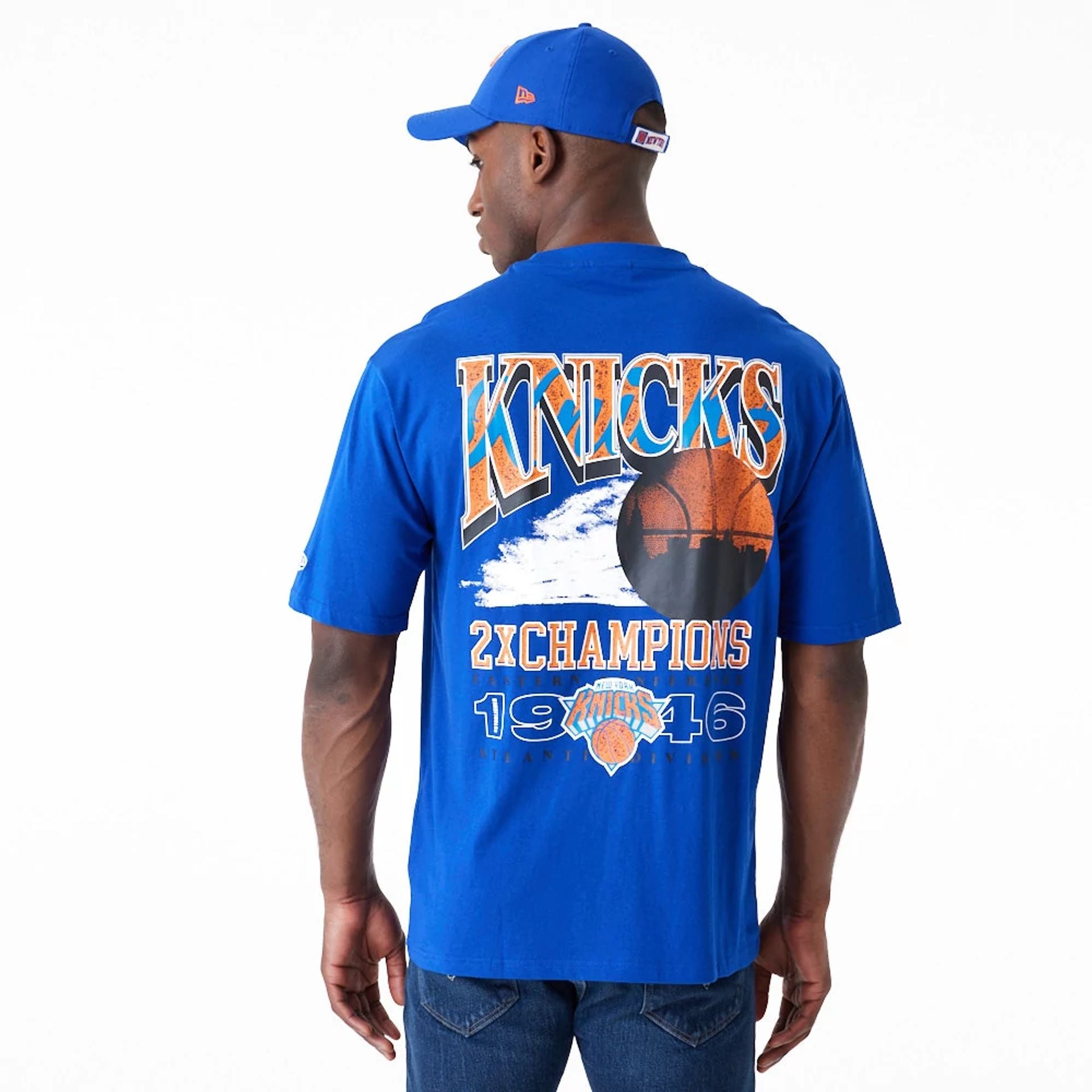 The Male model is wearing New York Knicks NBA Championship Blue Oversized T-Shirt 2