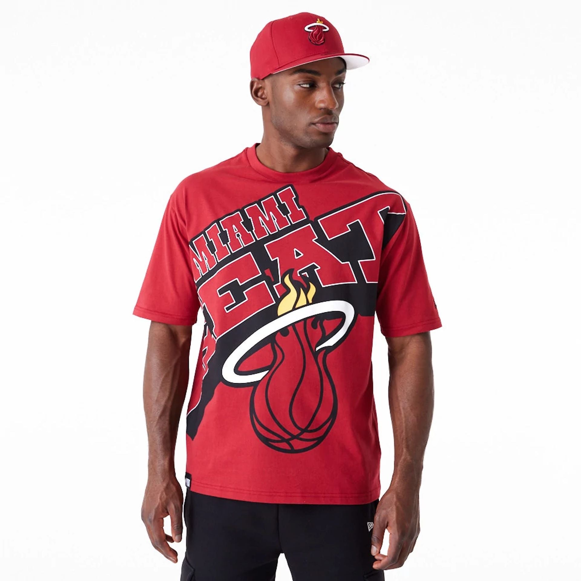 The Male model is wearing Miami Heat NBA Large Wordmark Dark Red Oversized T-Shirt 1