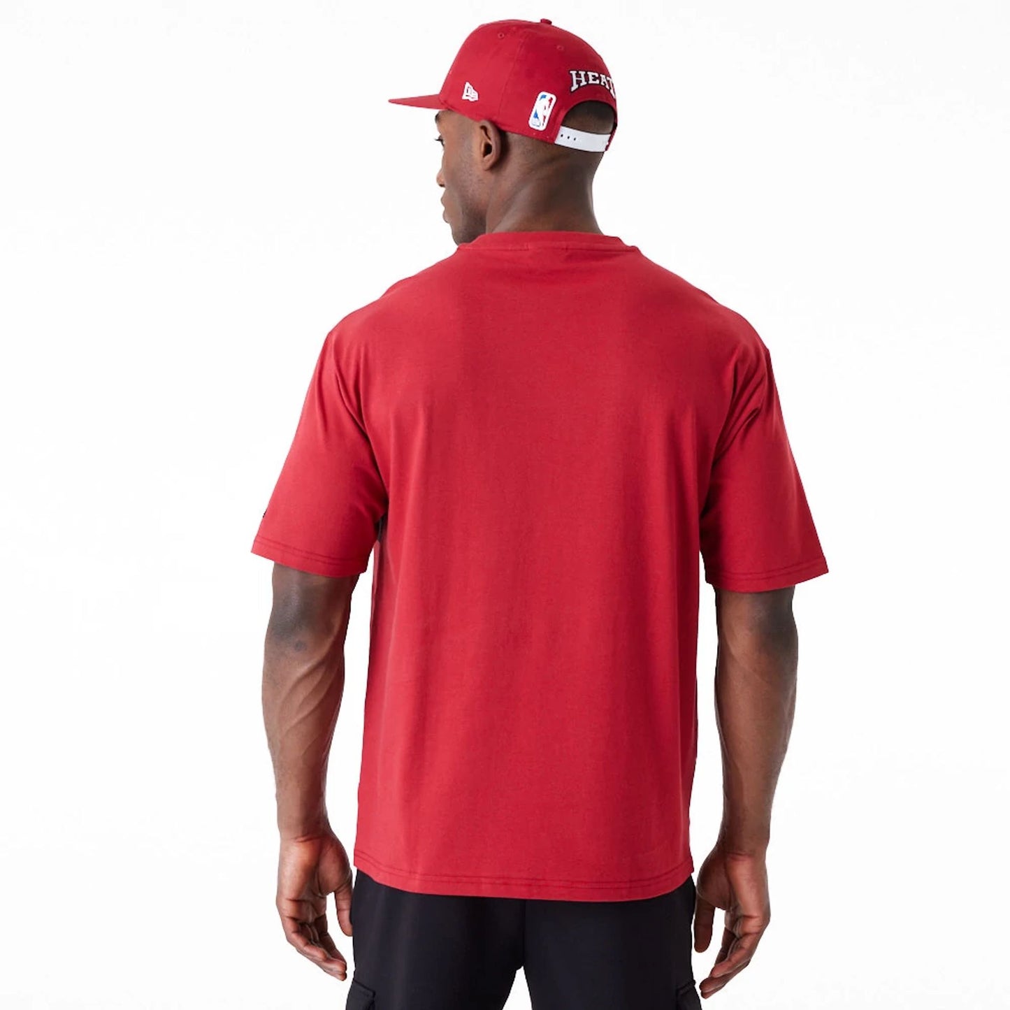 The Male model is wearing Miami Heat NBA Large Wordmark Dark Red Oversized T-Shirt 4