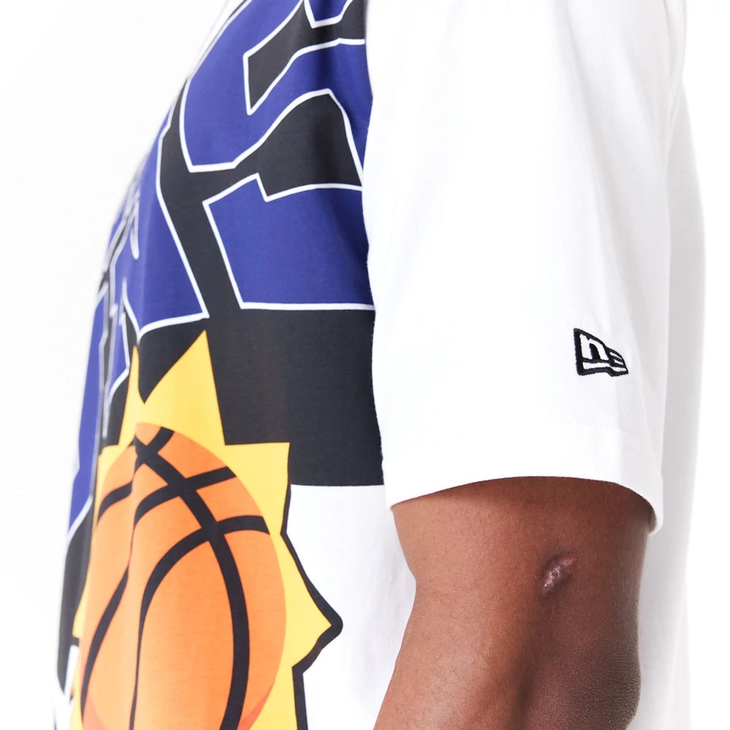 The Male model is wearing Phoenix Suns NBA Large Wordmark White Oversized T-Shirt 6