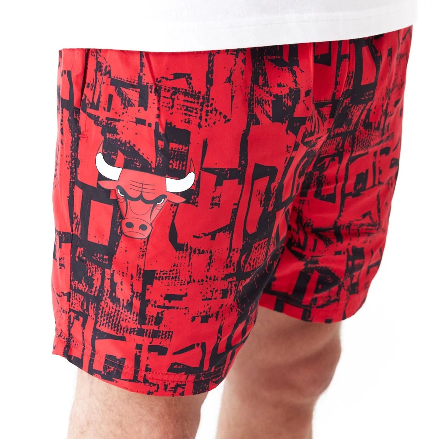 The Male model is wearing Chicago Bulls NBA All Over Print Red Shorts 3