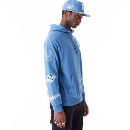 The Male model is wearing LA Dodgers MLB World Series Blue Oversized Pullover Hoodie 6