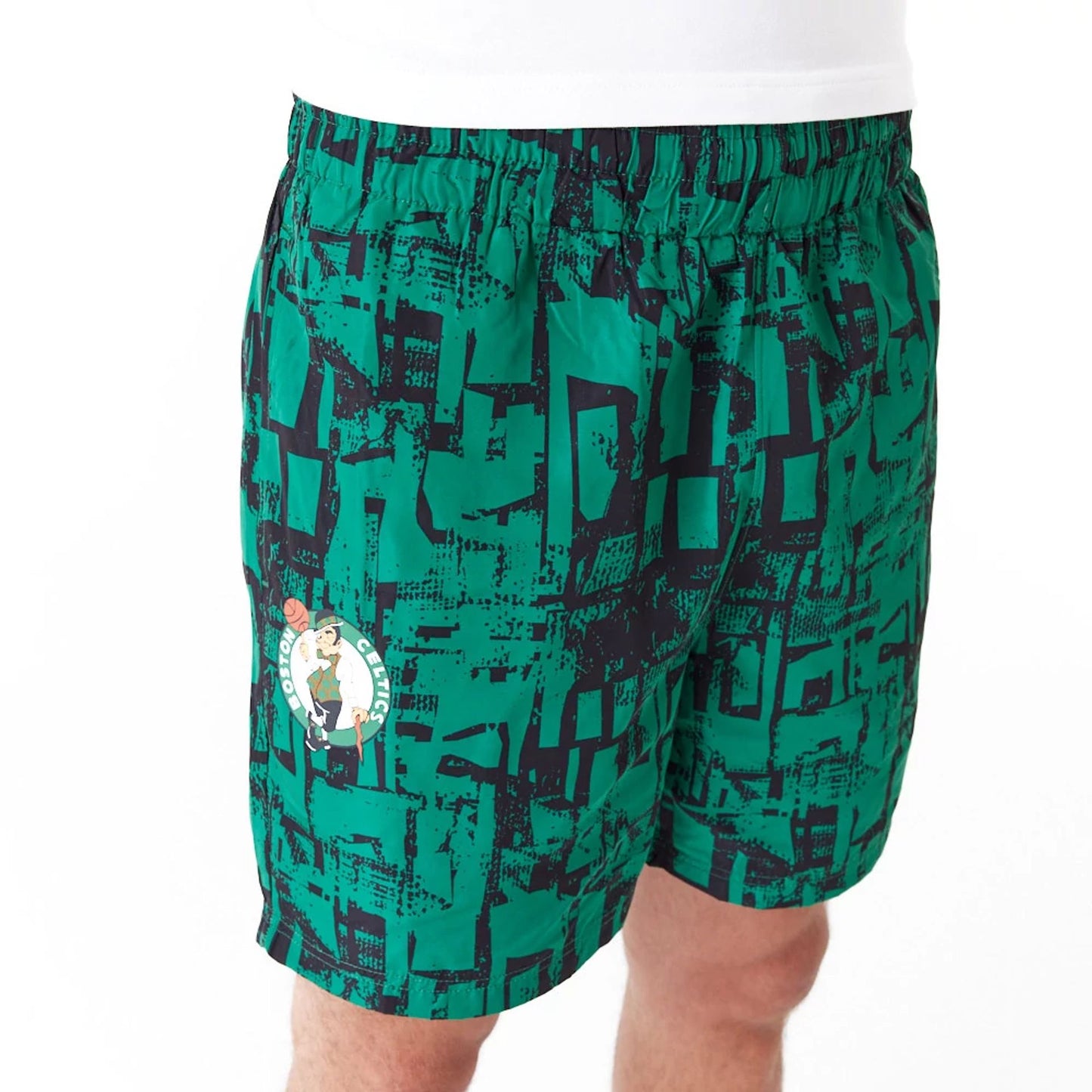 The Male model is wearing Boston Celtics NBA All Over Print Green Shorts 5