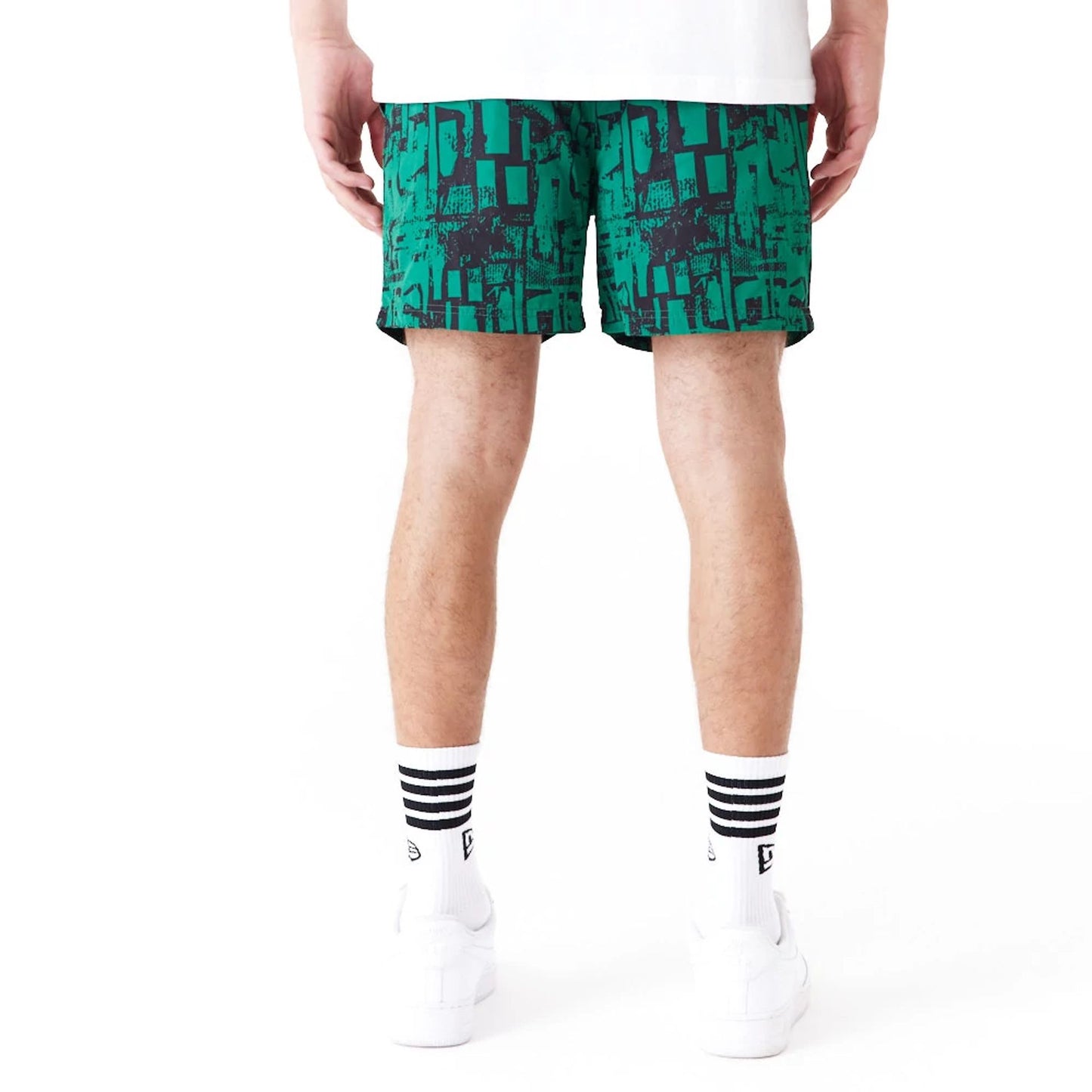 The Male model is wearing Boston Celtics NBA All Over Print Green Shorts 7