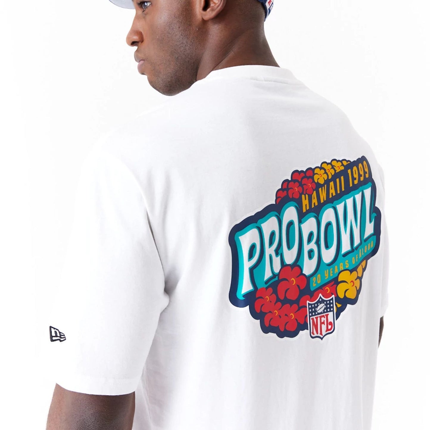 The Male model is wearing NFL Pro Bowl Hawaii NFC Floral Graphic White Oversized T-Shirt 5