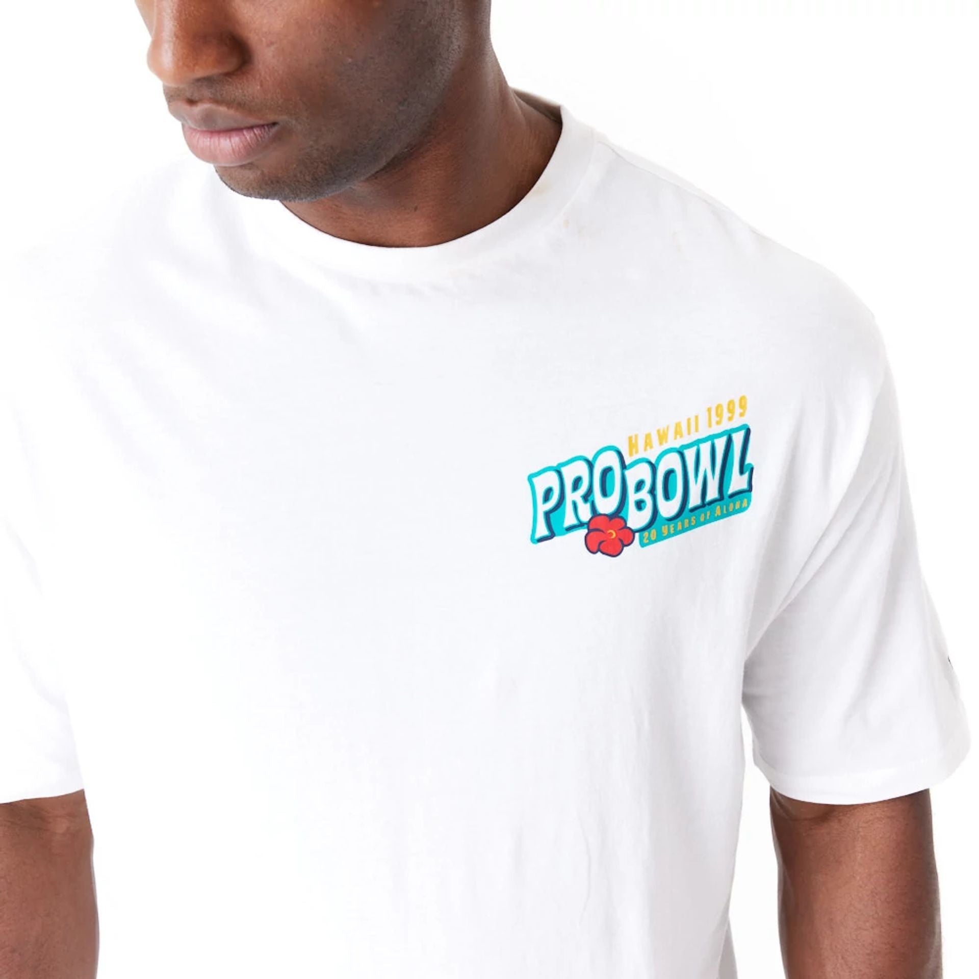 The Male model is wearing NFL Pro Bowl Hawaii NFC Floral Graphic White Oversized T-Shirt 2