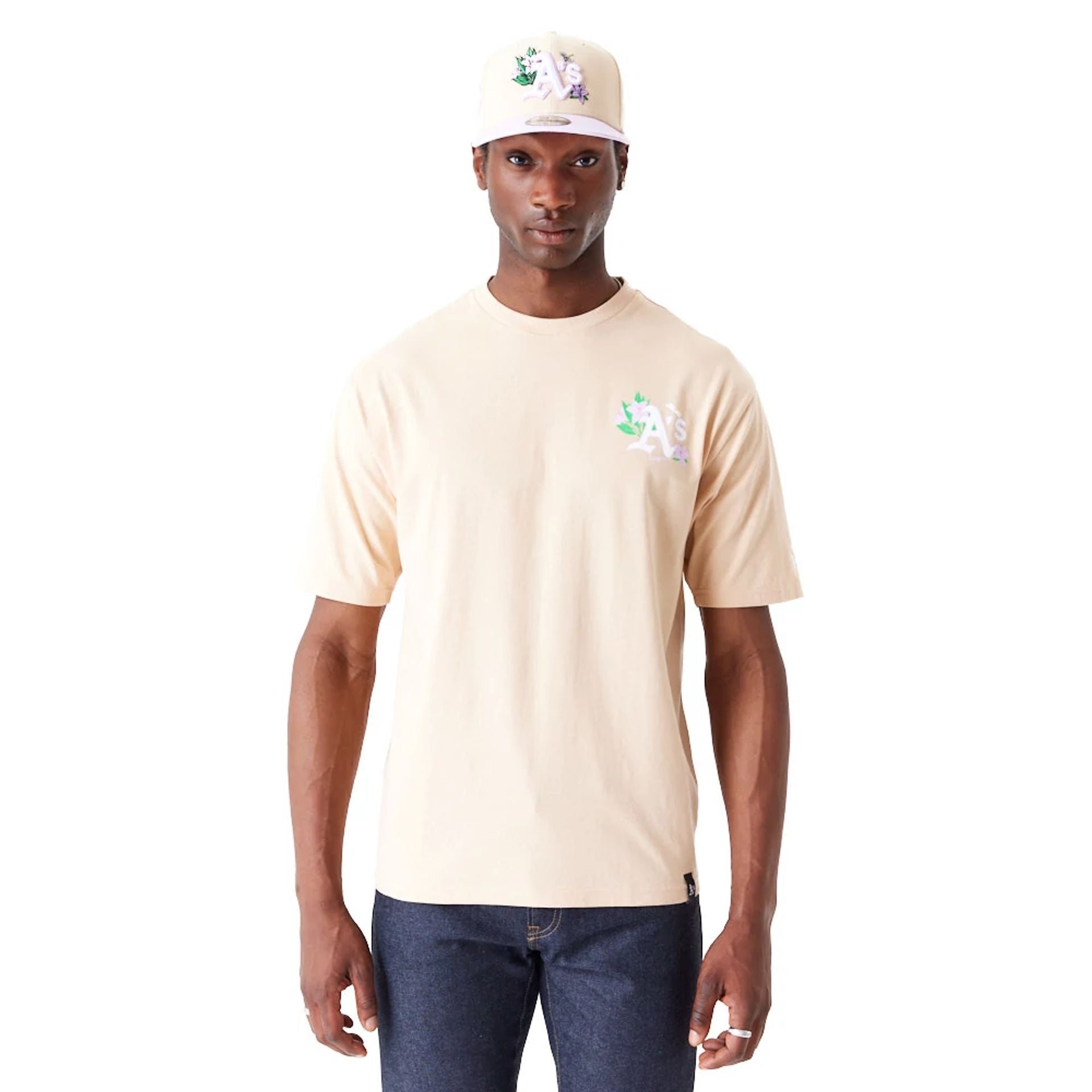 The Male model is wearing Oakland Athletics MLB Floral Graphic Light Beige Oversized T-Shirt 1