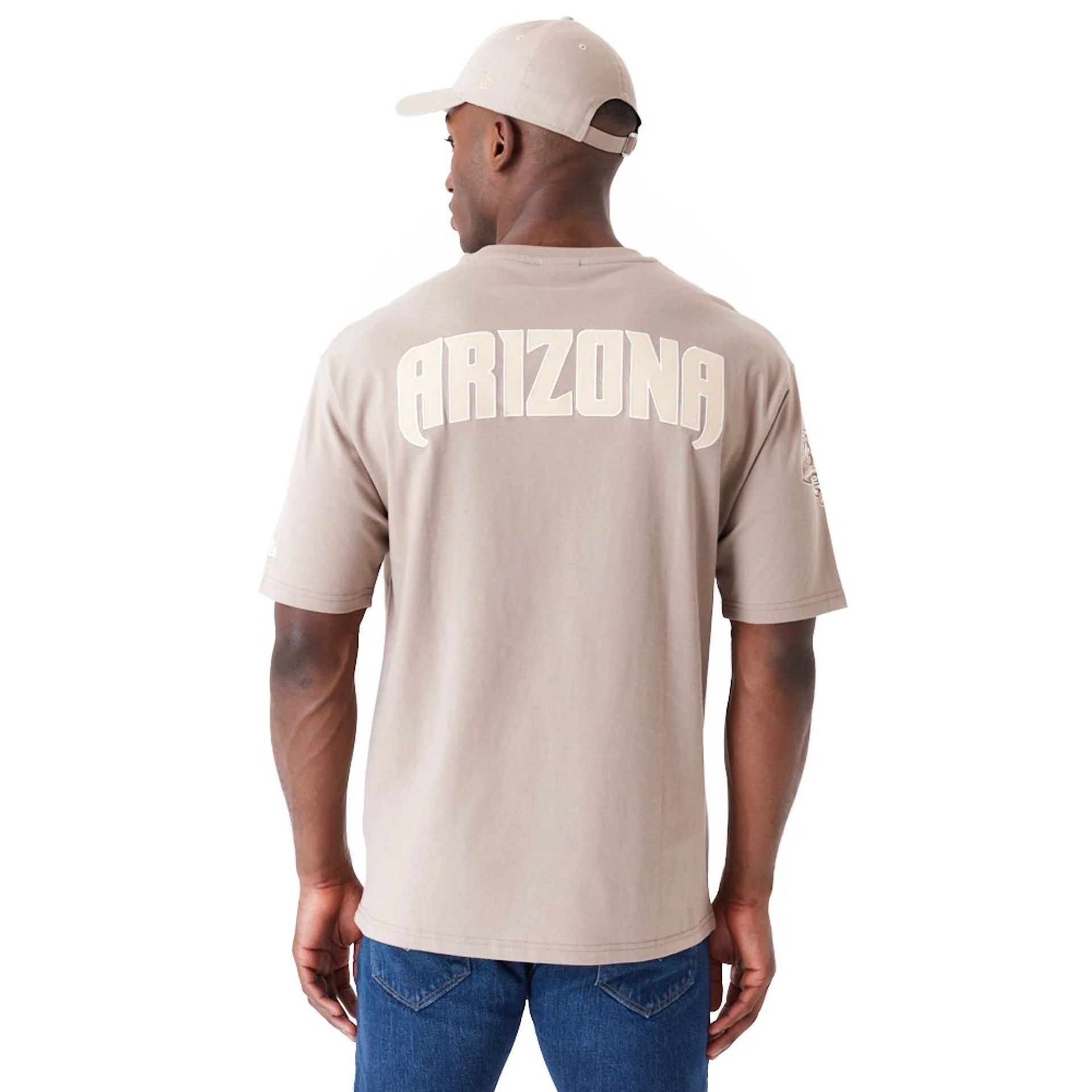 The Male model is wearing Arizona Diamondbacks World Series Pastel Brown Oversized T-Shirt 6