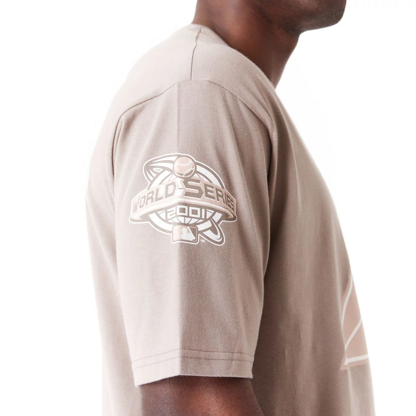 The Male model is wearing Arizona Diamondbacks World Series Pastel Brown Oversized T-Shirt 7