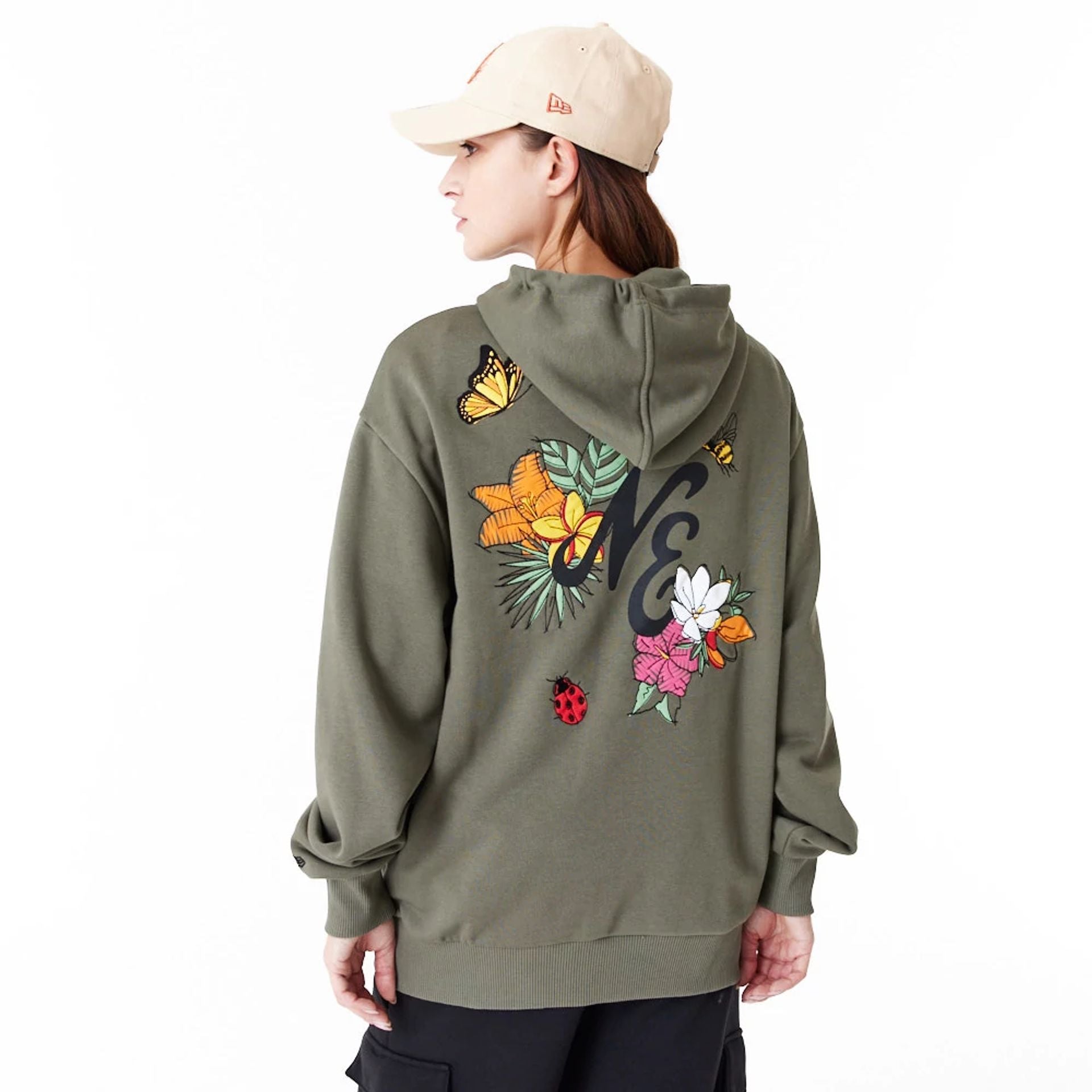 The Male model is wearing New Era Floral Graphic Green Oversized Pullover Hoodie 6