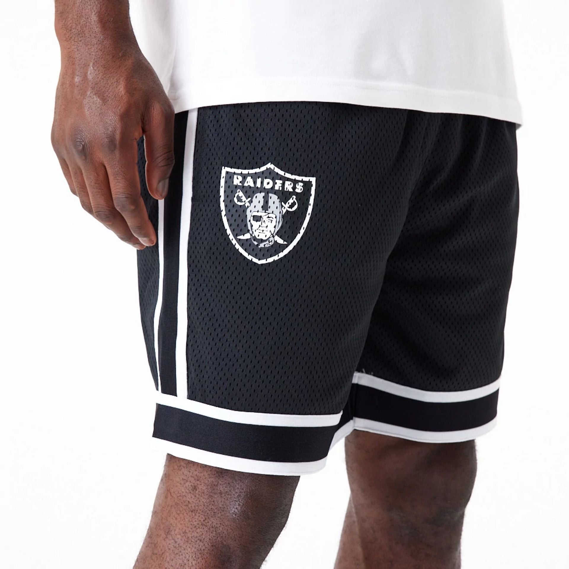 The Male model is wearing Las Vegas Raiders NFL Colour Block Black Shorts 8