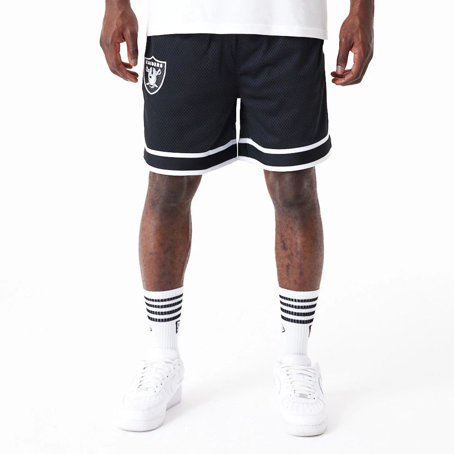 The Male model is wearing Las Vegas Raiders NFL Colour Block Black Shorts 6