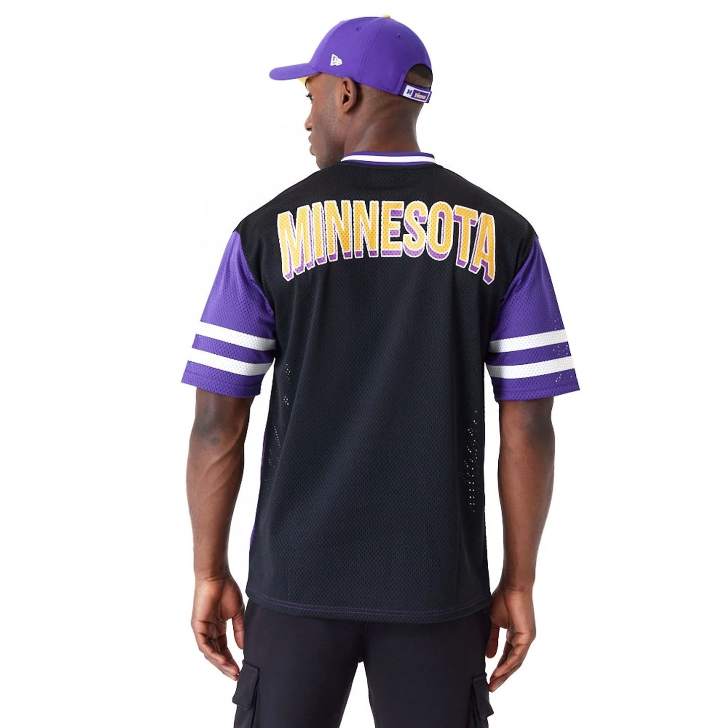 The Male model is wearing Minnesota Vikings NFL Wordmark Graphic Purple T-Shirt 6