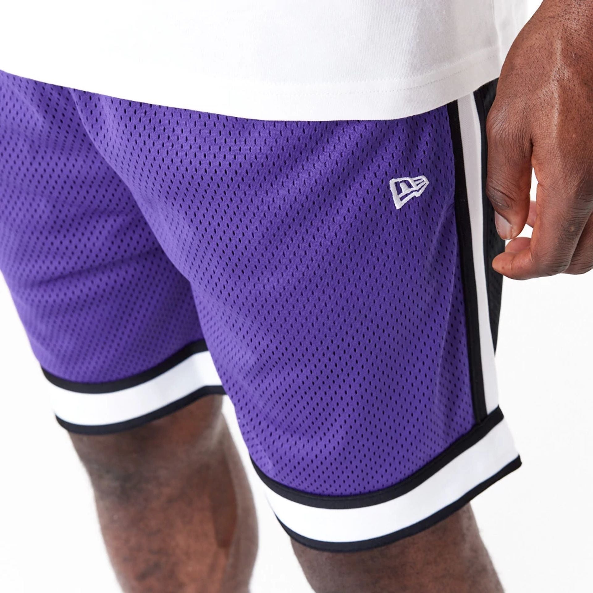 The Male model is wearing Minnesota Vikings NFL Colour Block Purple Shorts 8