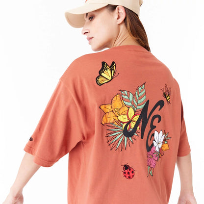 The Male model is wearing New Era Floral Graphic Brown Oversized T-Shirt 5