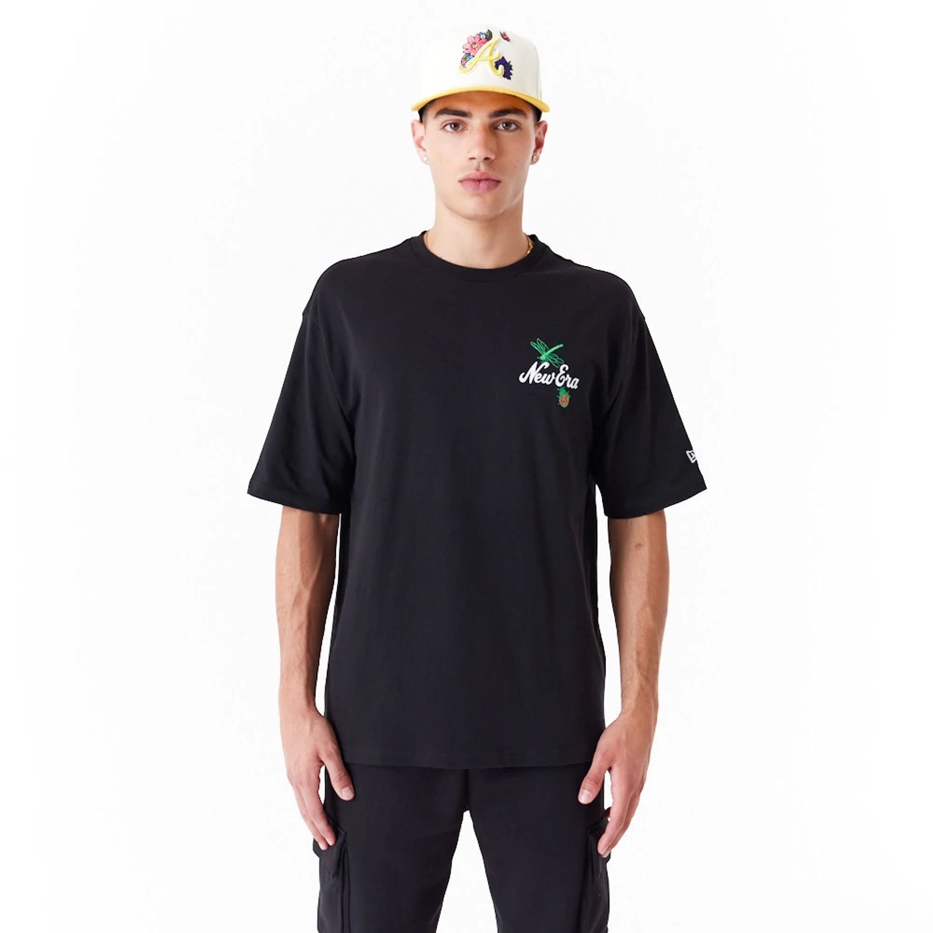 The Male model is wearing New Era Floral Graphic Black Oversized T-Shirt 8