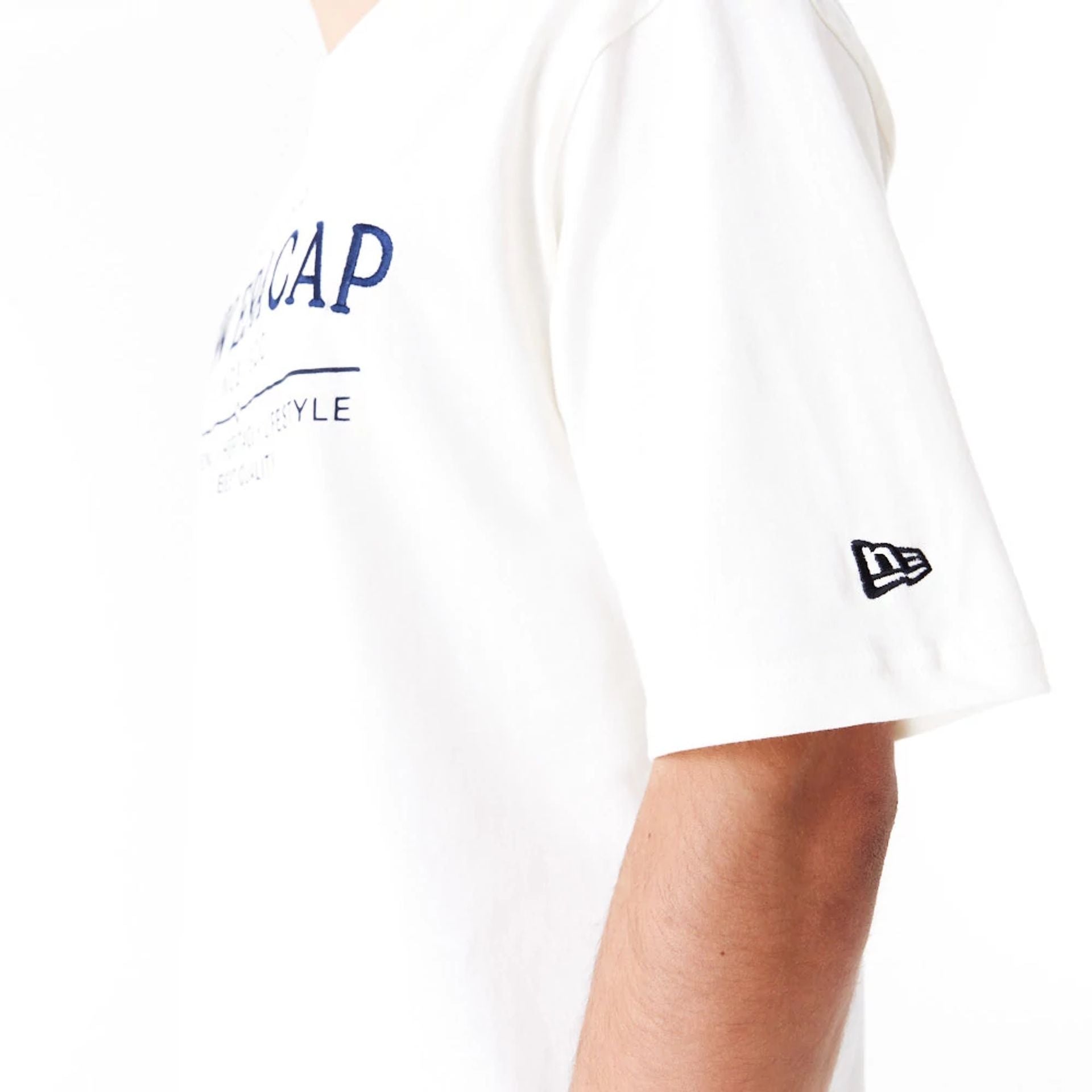 The Male model is wearing New Era Graphic White Oversized T-Shirt 3