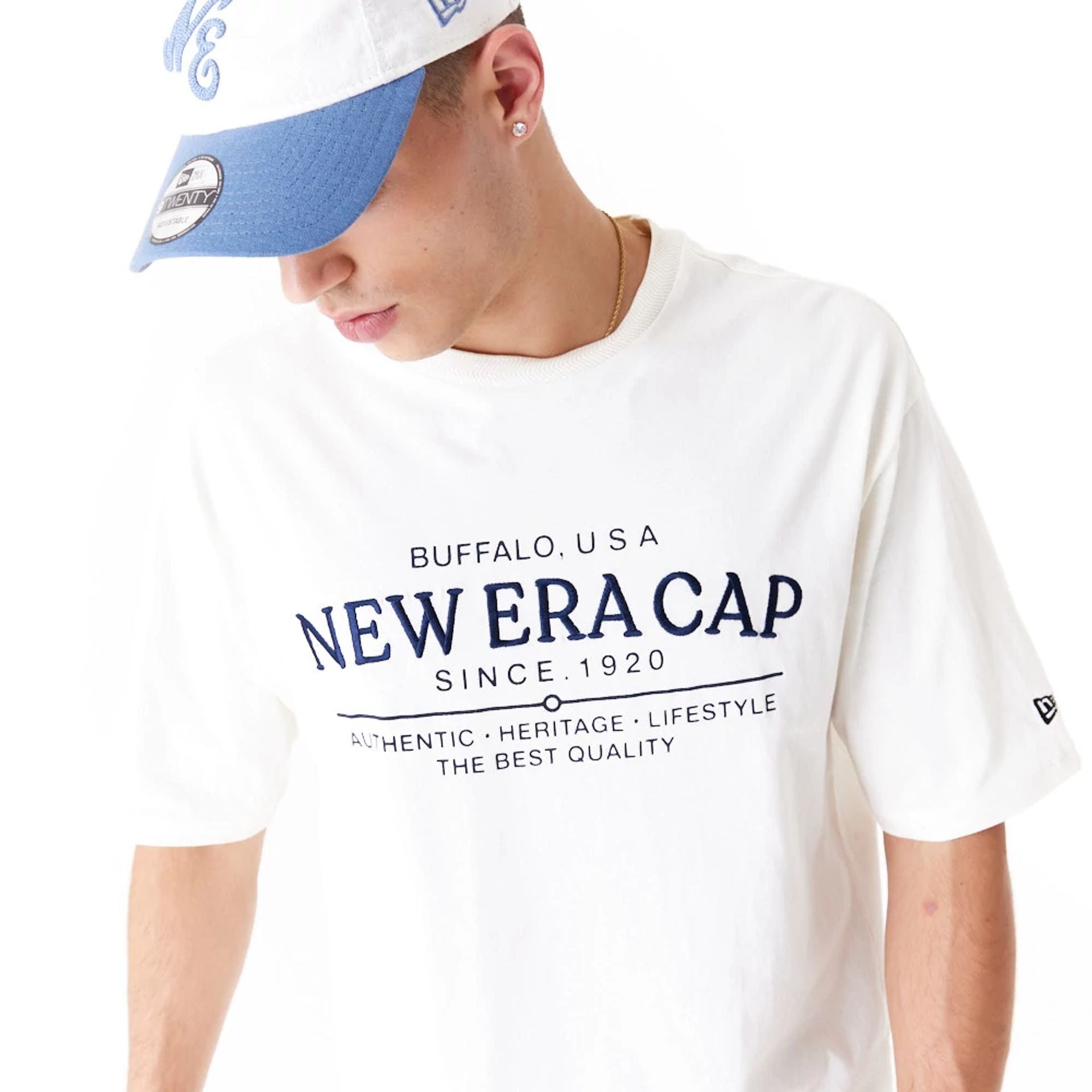 The Male model is wearing New Era Graphic White Oversized T-Shirt 6