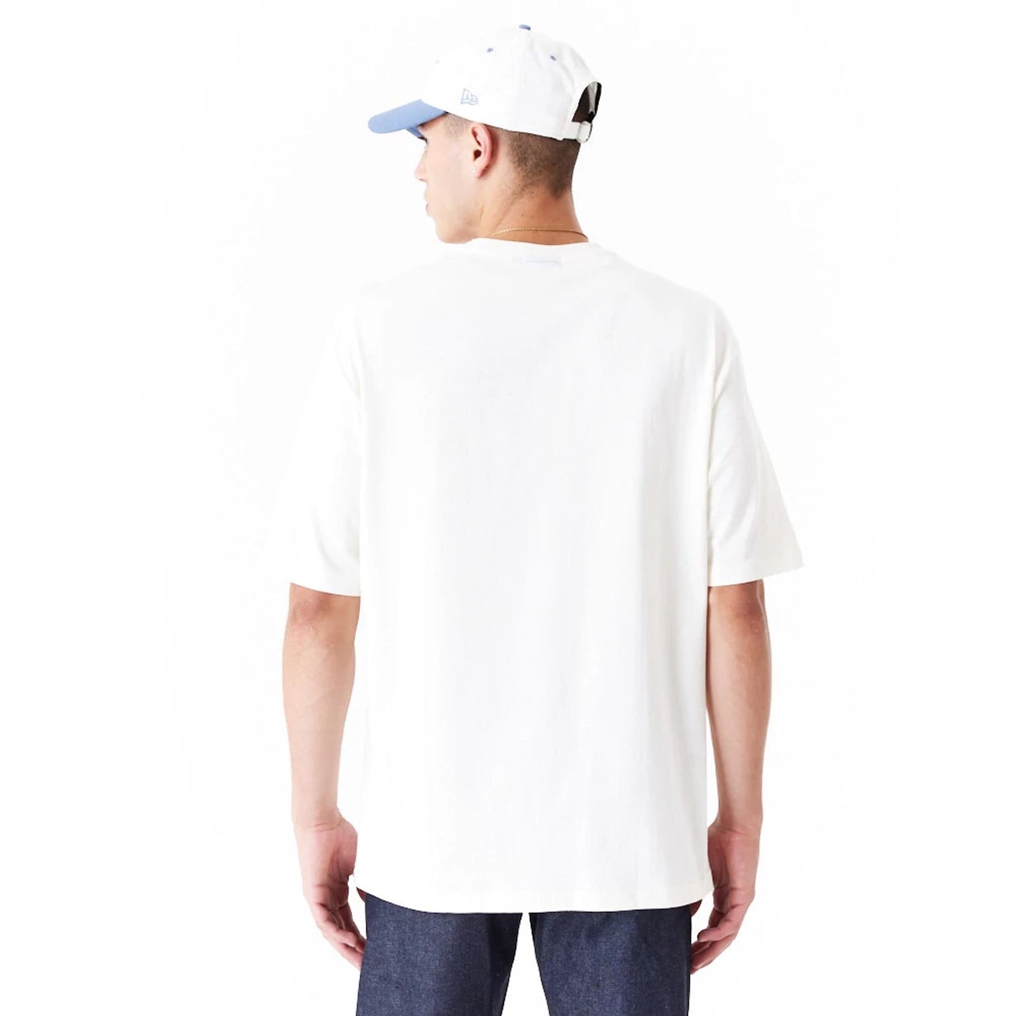 The Male model is wearing New Era Graphic White Oversized T-Shirt 7