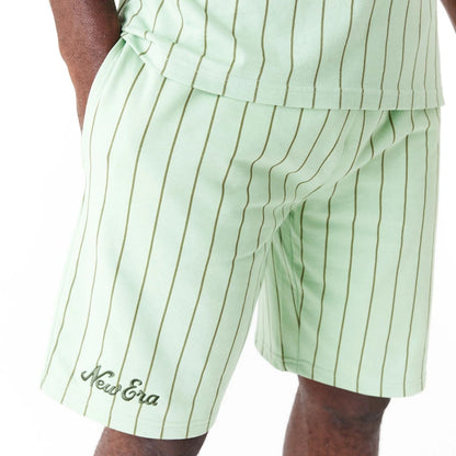 The Male model is wearing New Era Pinstripe Bright Green Shorts 7