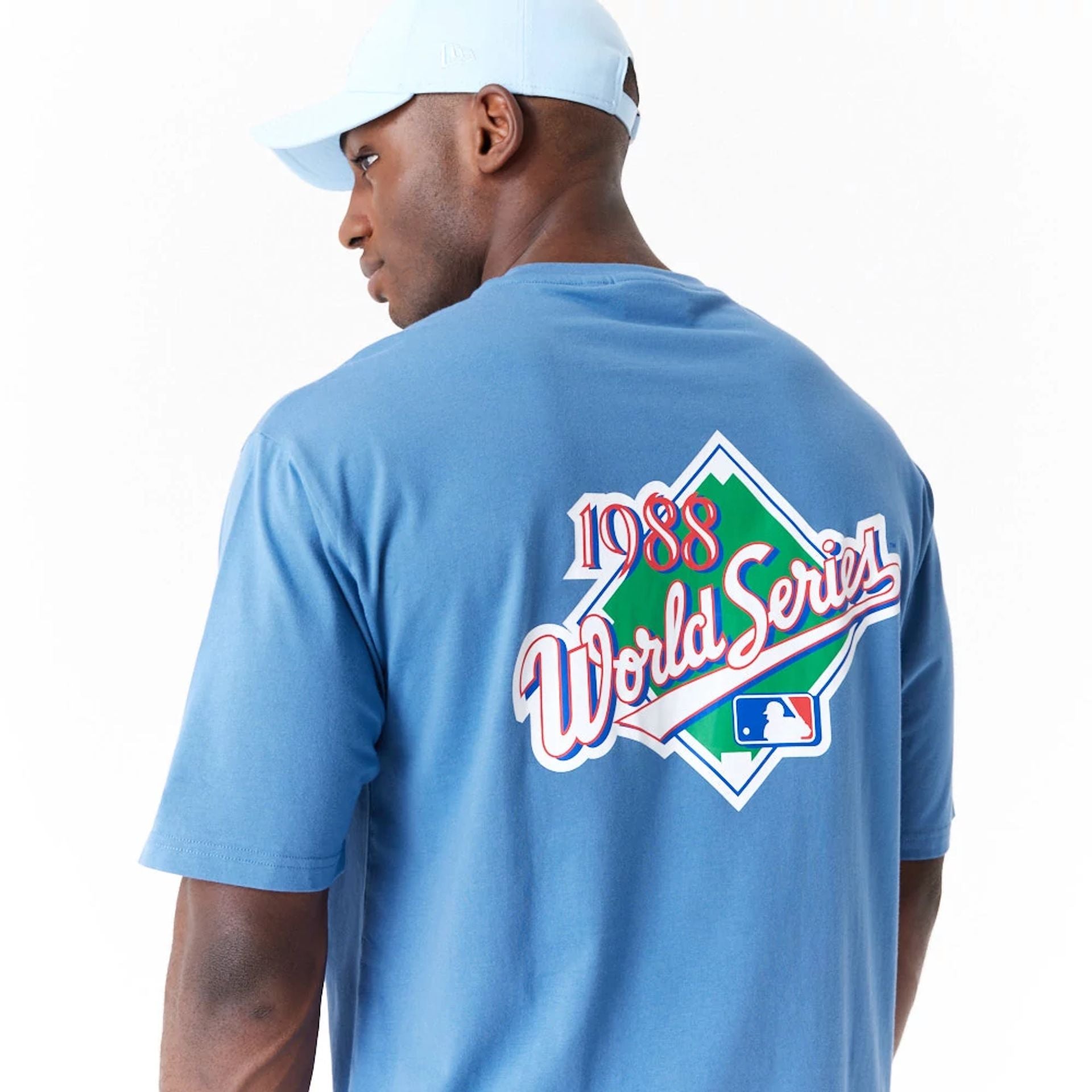 The Male model is wearing LA Dodgers MLB World Series Blue Oversized T-Shirt 6