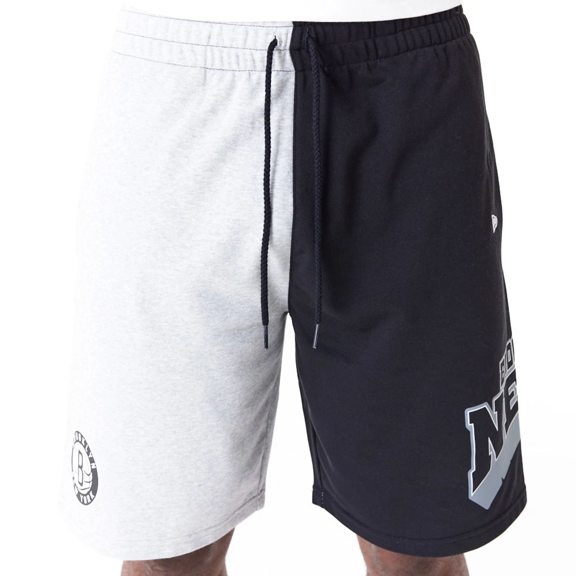 The Male model is wearing Brooklyn Nets NBA Graphic Grey Shorts 3